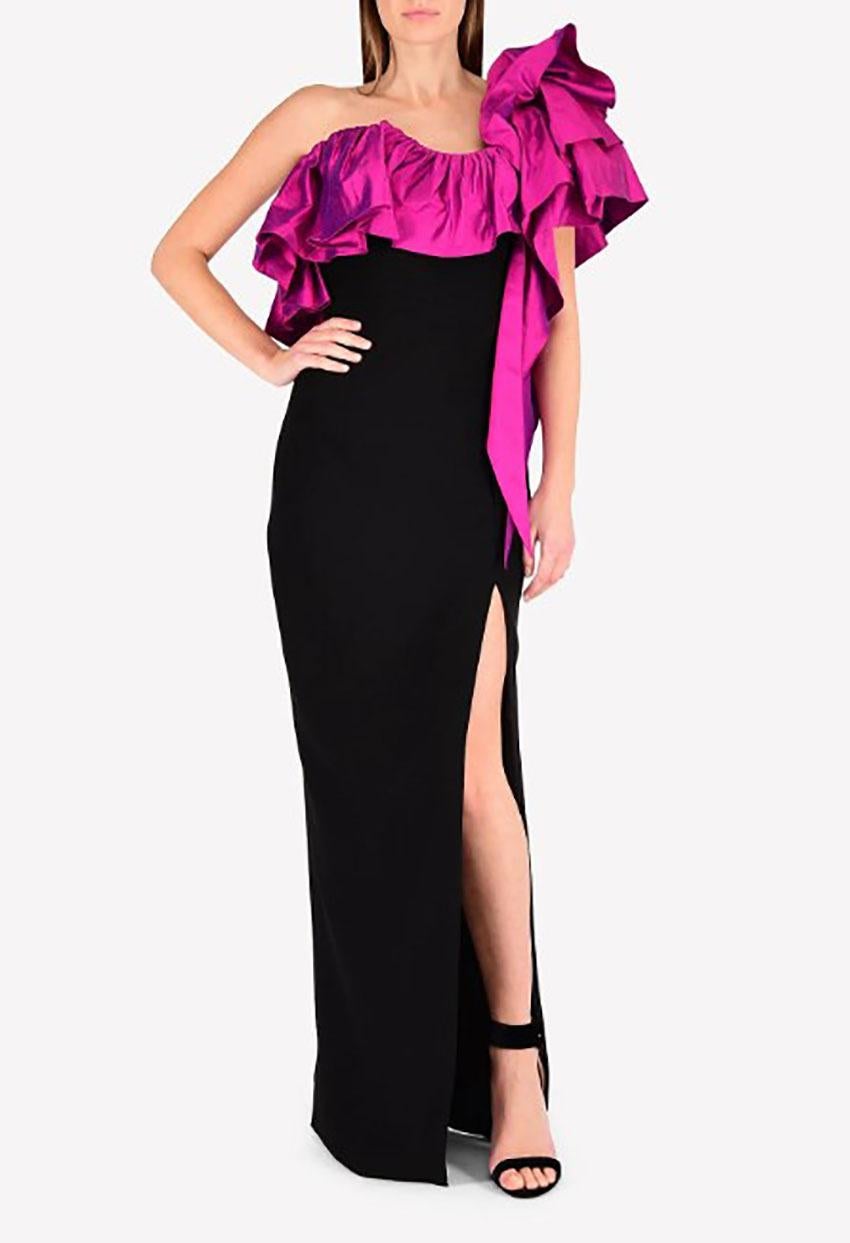 RASARIO

BLACK and MAGENTA LONG EVENING DRESS

The Russian label showcases its feminine appeal in this black dress with one-shoulder dress featuring a magenta ruffled sleeve and high slit on the front. Details
One-shoulder dress
Ruffled sleeve
Inner