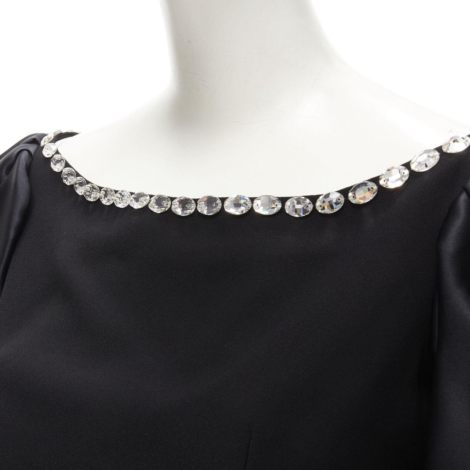 RASARIO black crystal embellished neckline puff balloon sleeves dress FR36 S
Reference: AAWC/A00191
Brand: Rasario
Material: Polyester, Silk
Color: Black
Pattern: Solid
Closure: Zip
Lining: Fabric
Made in: Russia

CONDITION:
Condition: Excellent,