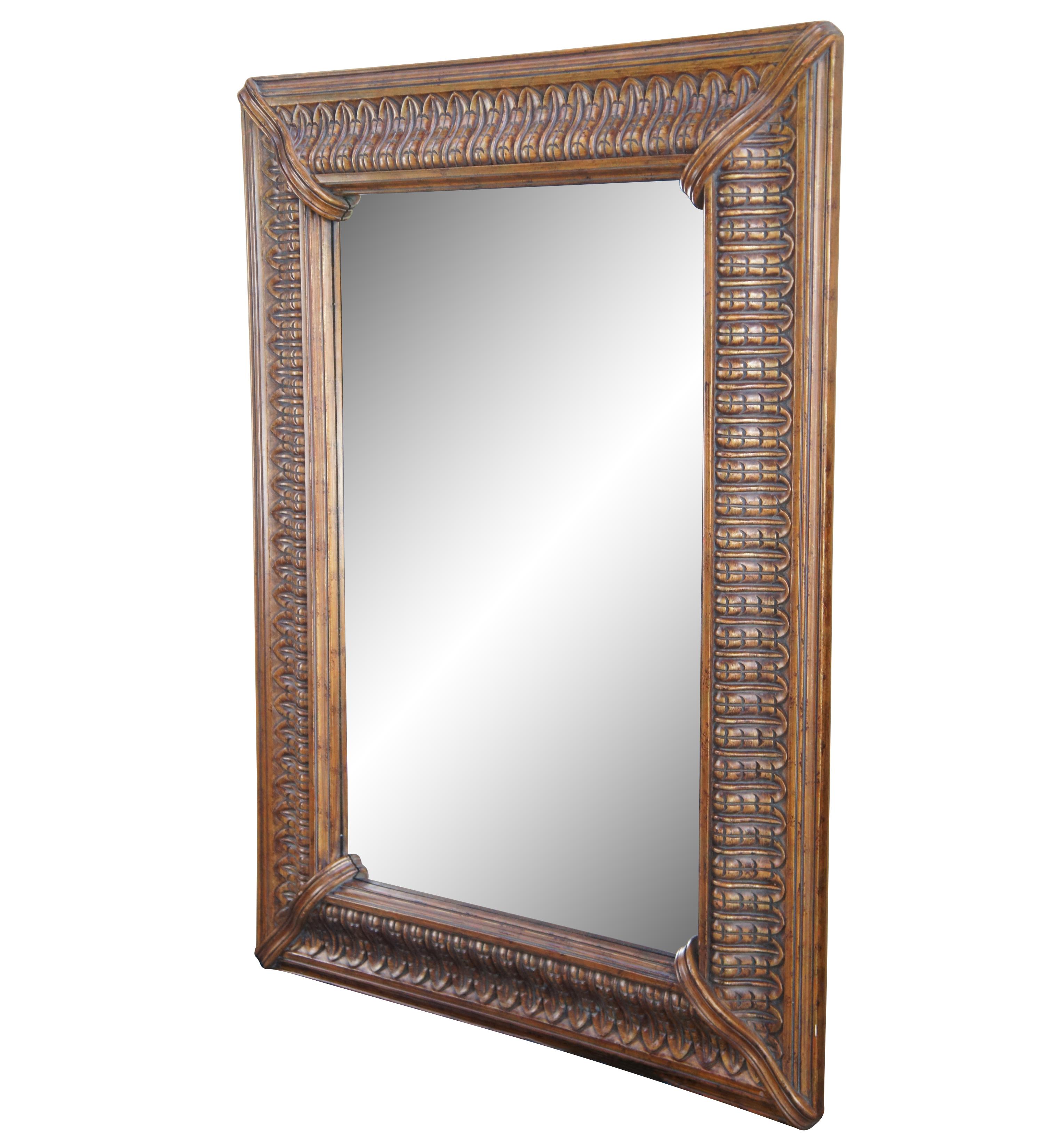 Vintage Raschella Collection beveled vanity or mantel mirror featuring an ornate pecan wood frame. Set up for vertical or horizontal hanging.

Raschella Collection Inc, founded in 1999, is an importer based in Pico Rivera California that