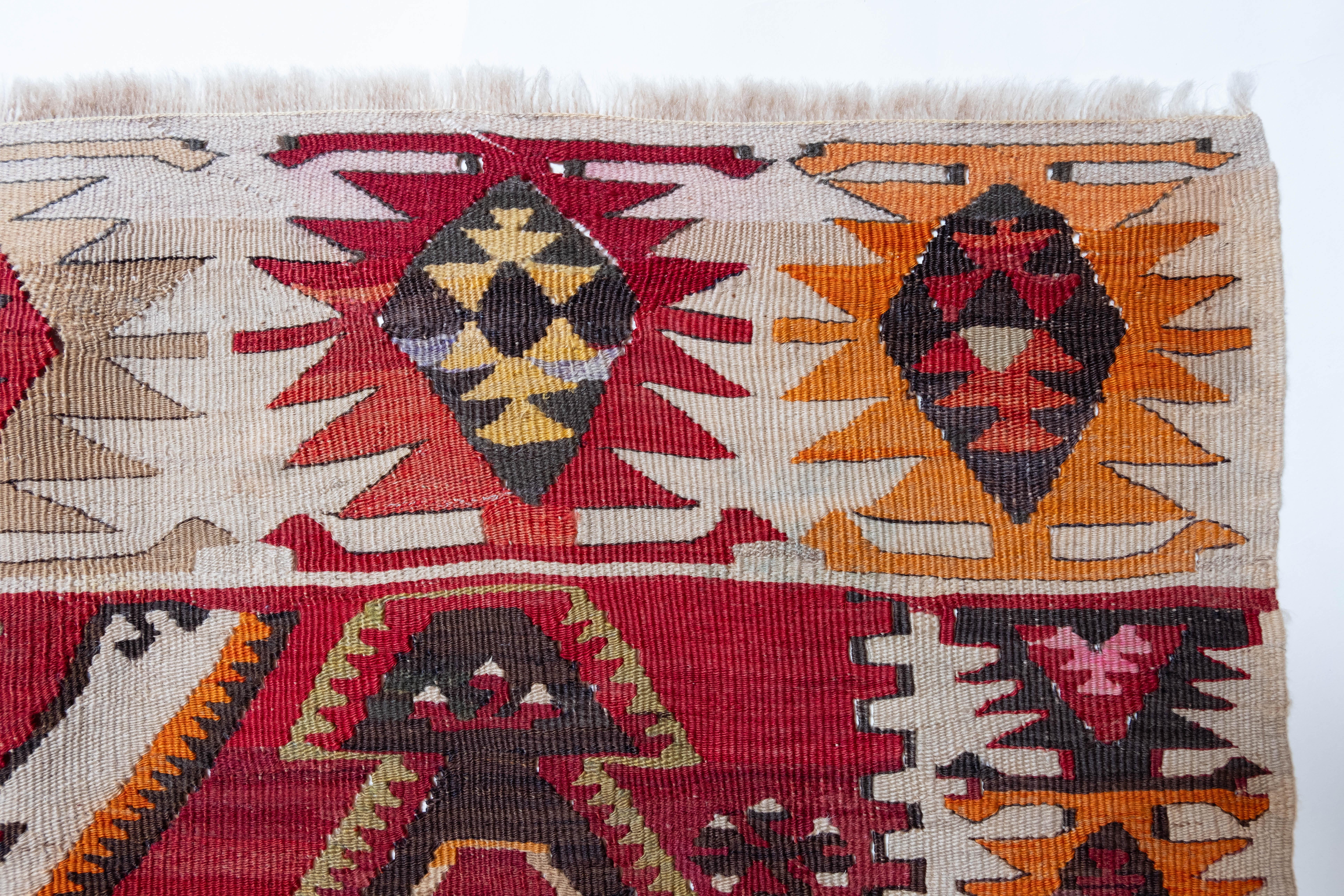 This is Eastern Anatolian Antique Rashwan Design Kilim, from the Kayseri region with a rare and beautiful color composition.

This highly collectible antique kilim has wonderful special colors and textures that are typical of an old kilim in good