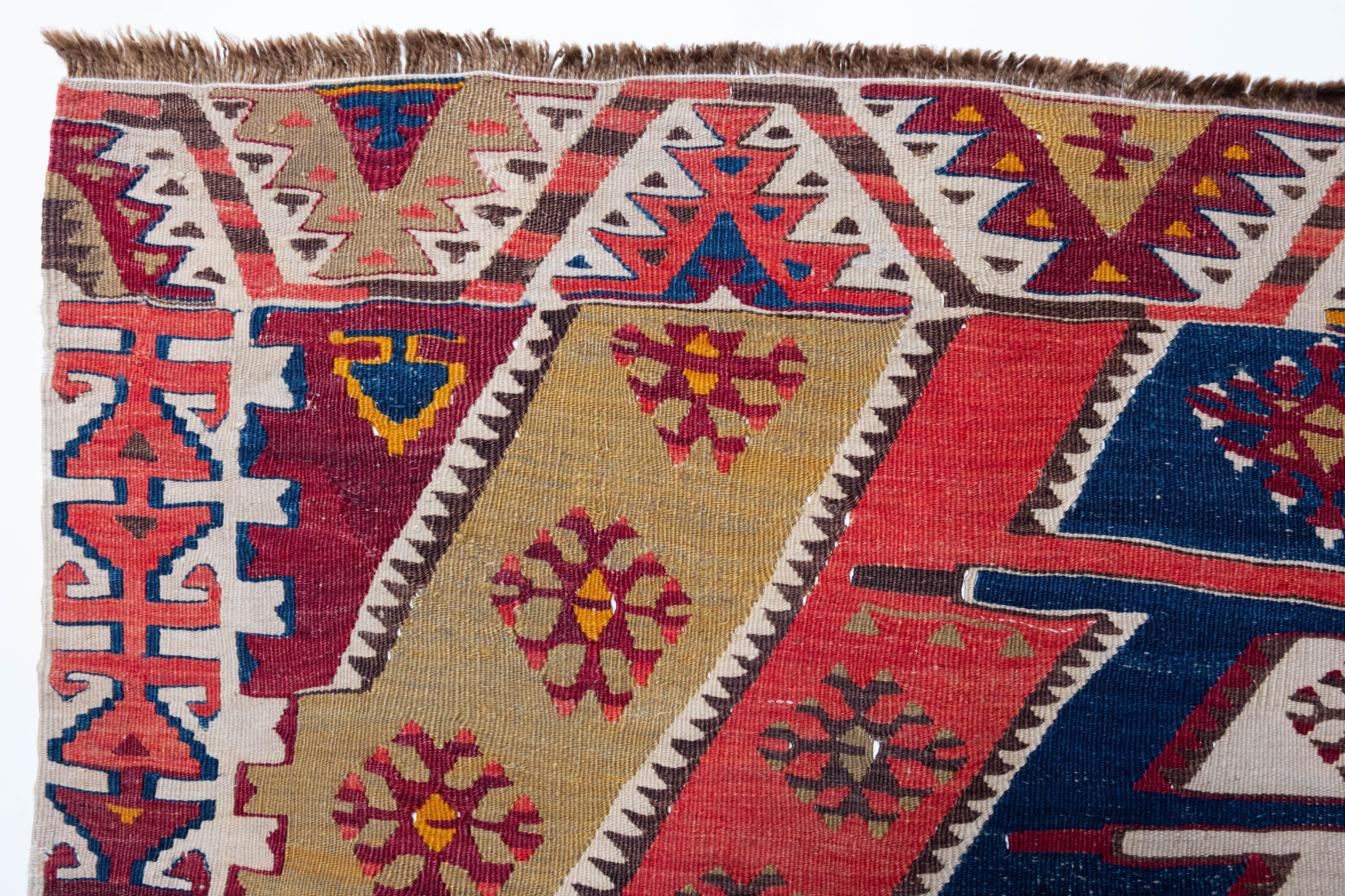 This is Eastern Anatolian Antique Kilim from the Rashwan, Malatya region with a rare and beautiful color composition.

This highly collectible antique kilim has wonderful special colors and textures that are typical of an old kilim in good