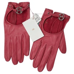 Guantes de piel frambuesa con "H" de metal plateado  Hermès (Nuevo con etiqueta)