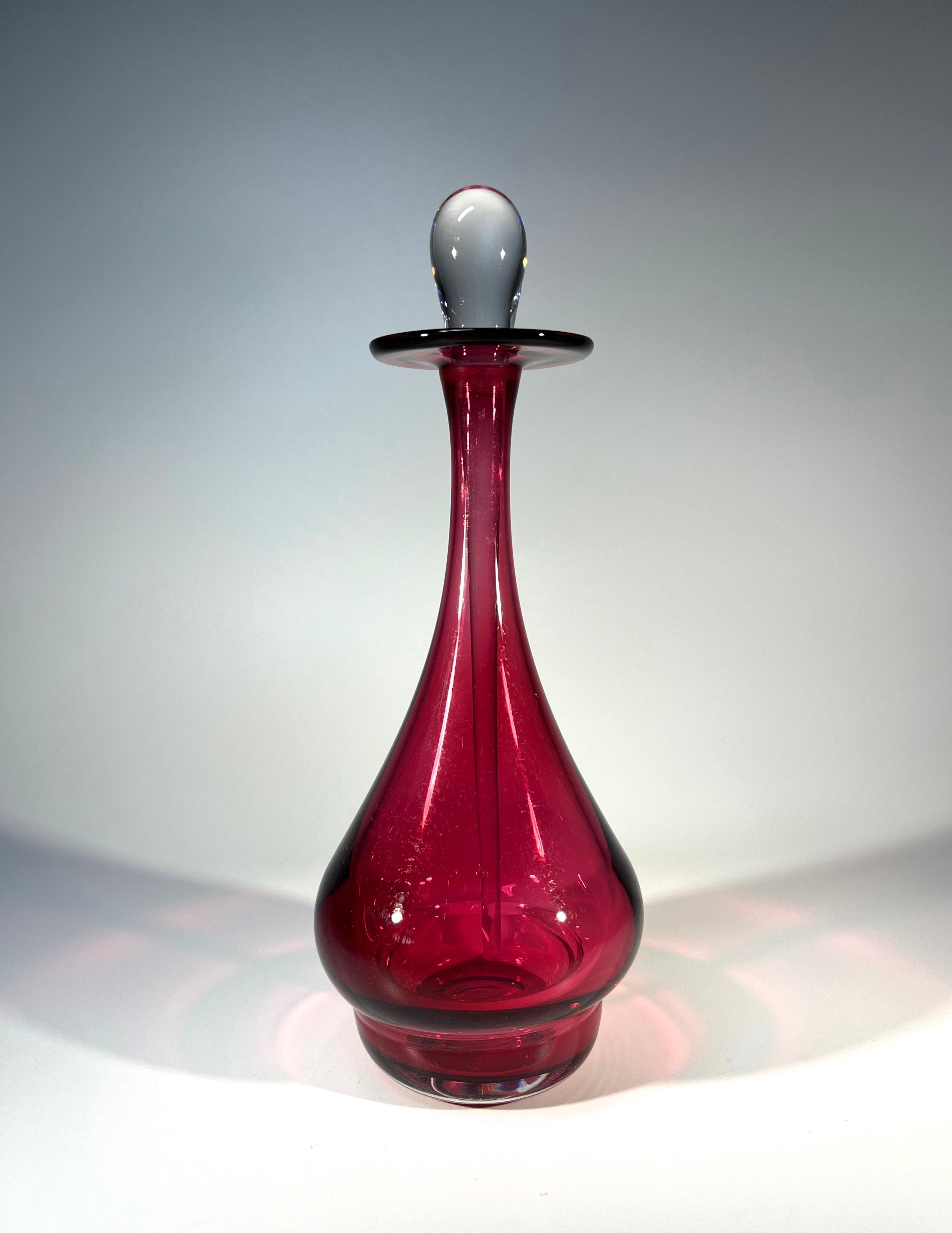 Delicious Raspberry pink glass perfume bottle, traditionally hand crafted by Bristol Glass, England
Beautifully shaped bottle with a fabulous elongated clear dropper spear
An elegant and desirable bottle
Circa 2000
Height 7.5 inch, Diameter