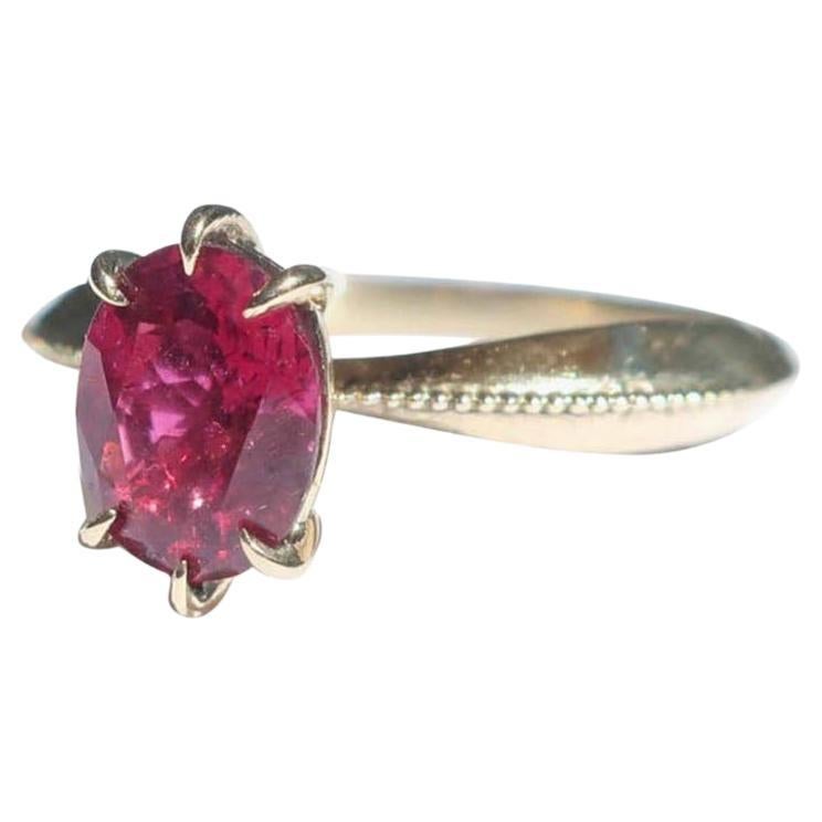 Raspberry Tourmaline Claw Set 14 Karat Yellow Gold Solitaire Ring For Sale