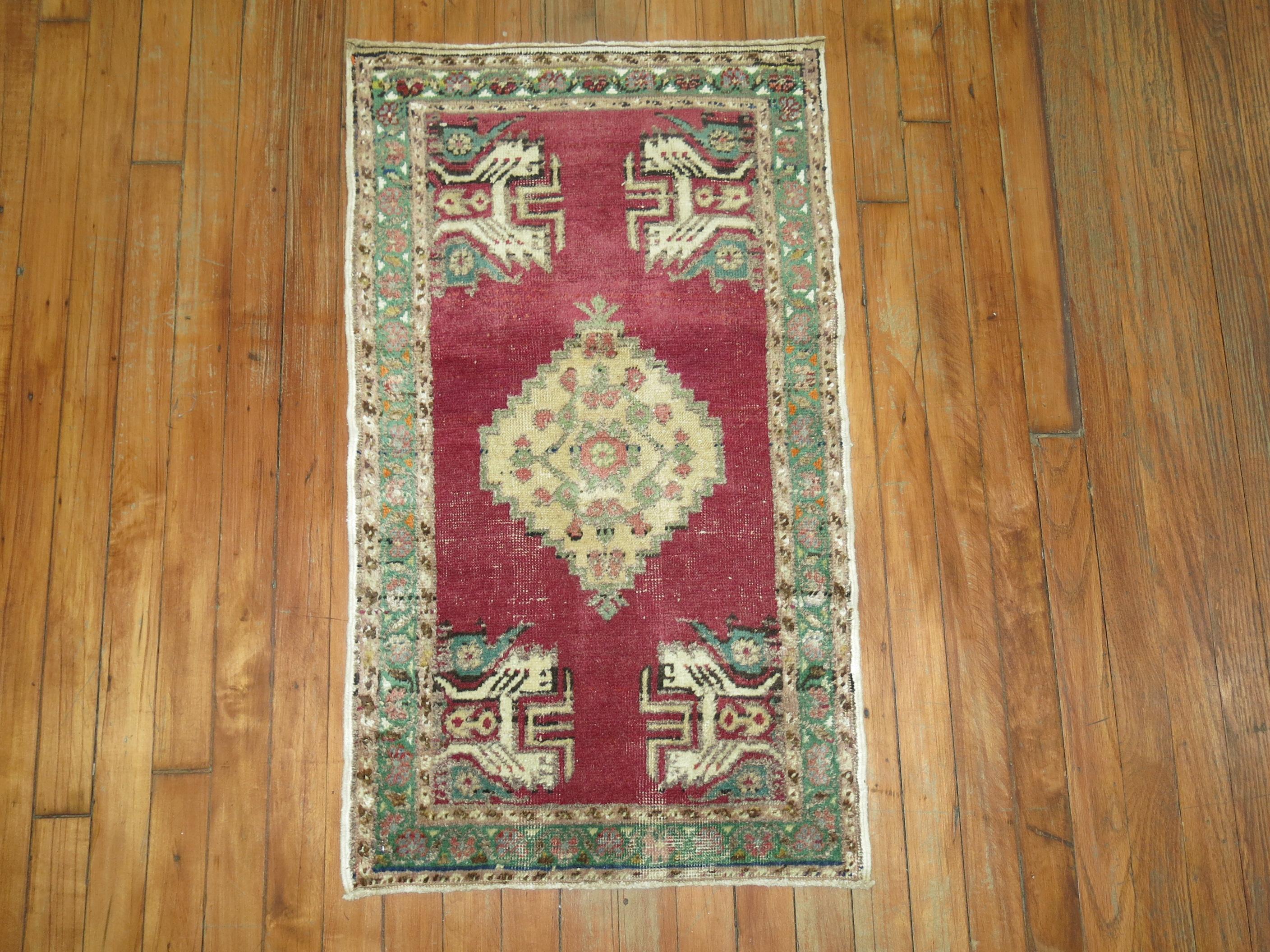 A vintage Anatolian Turkish Yastik rug mat.
