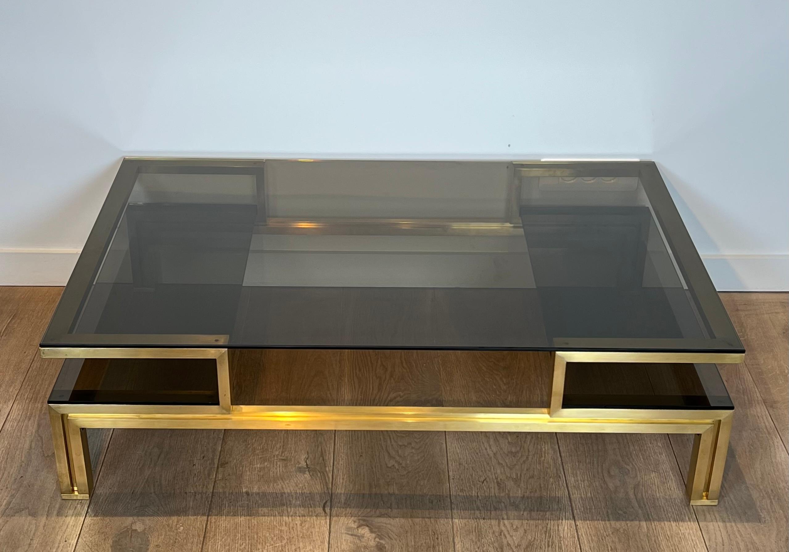Mid-Century Modern rass Coffee Table with Smoked Glass Shelves by Guy Lefèvre for Maison Jansen en vente