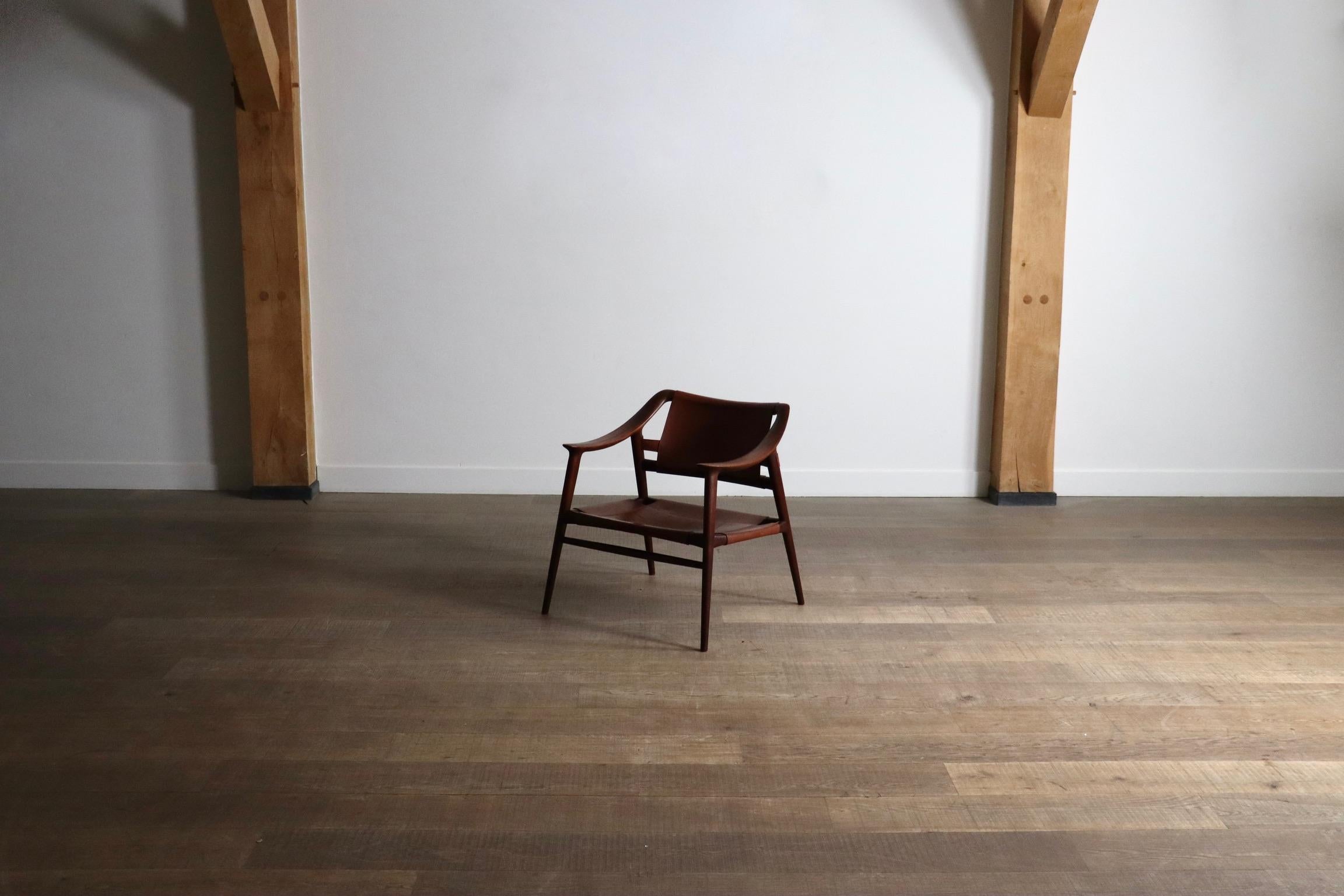 Stunning lounge chair model 56/2 designed by Rolf Rastad and Adolf Relling for Gustav Bahus, Norway, 1954.

Very nicely sculptural lounge chair, also known as the ‘Bambi’. The design feautures a minimalistic frame with interesting shapes, giving