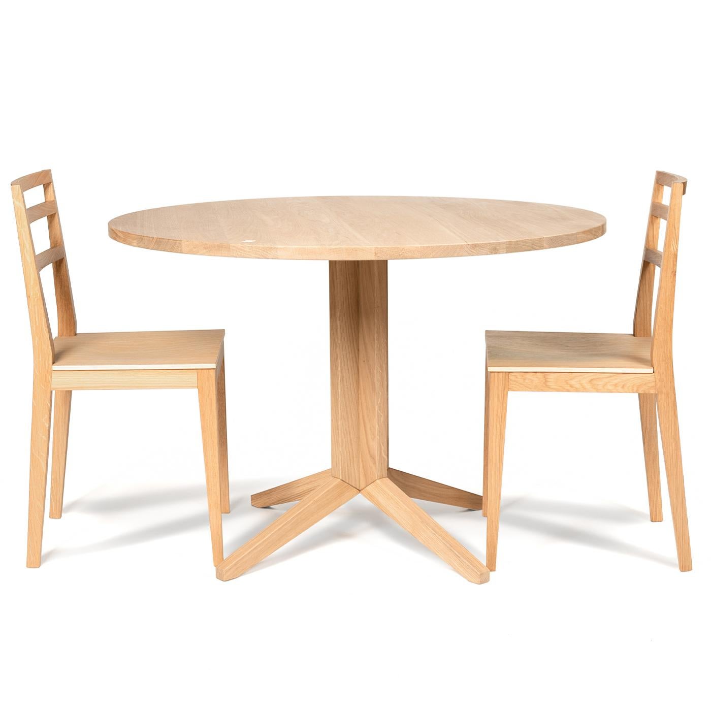 This elegant, simple round table is a wonderful addition to any dining or office space with a modern touch. The structure of the table, including the column and four legs, is in solid oak while the tabletop is in wood laminate, all coated in a