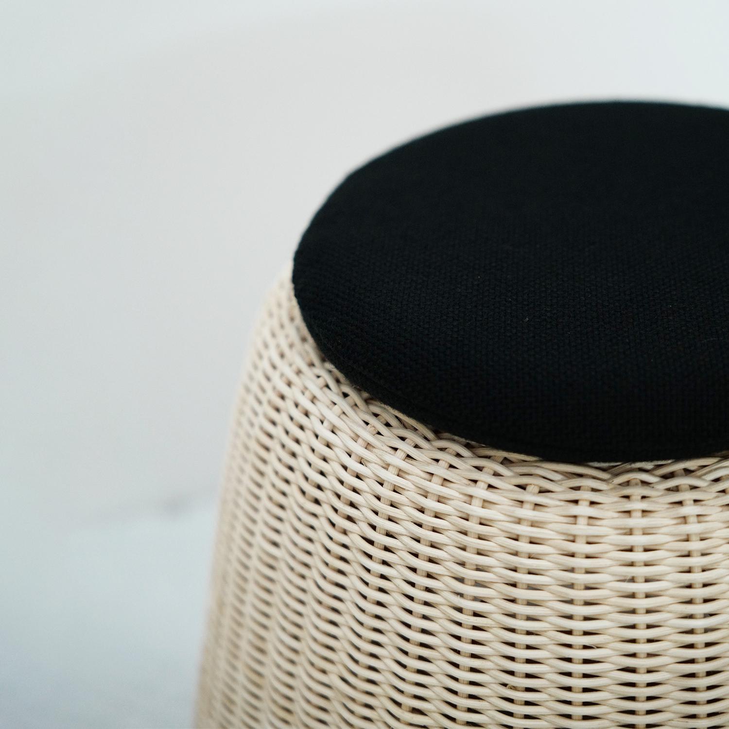 This is the smallest of Isamu Kenmochi's Ratan stools. It is just the right size for small children.
The cushion is fixed so it will not fall off. 
This is a made-to-order product and takes about 4 months to produce.
You can choose the fabric of the