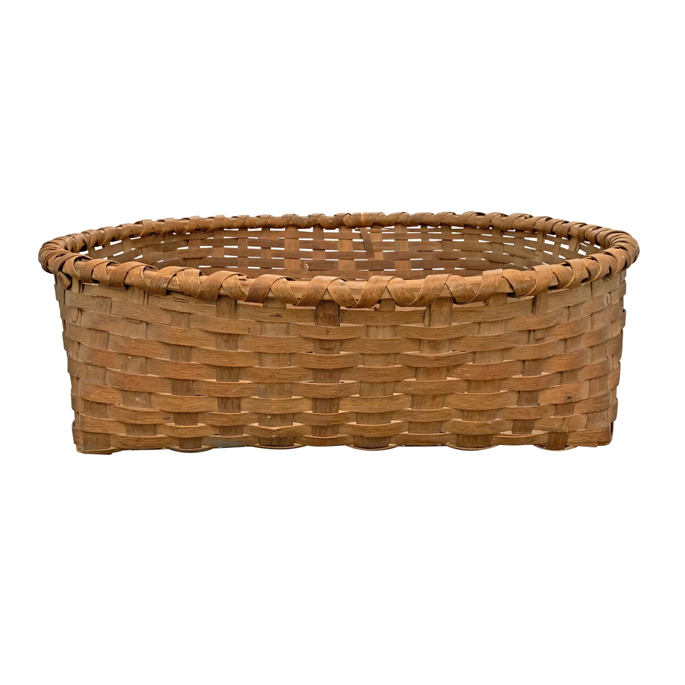 A rather large 19th century American split oak basket with a low profile, probably used to collect wool, found in upstate New York.