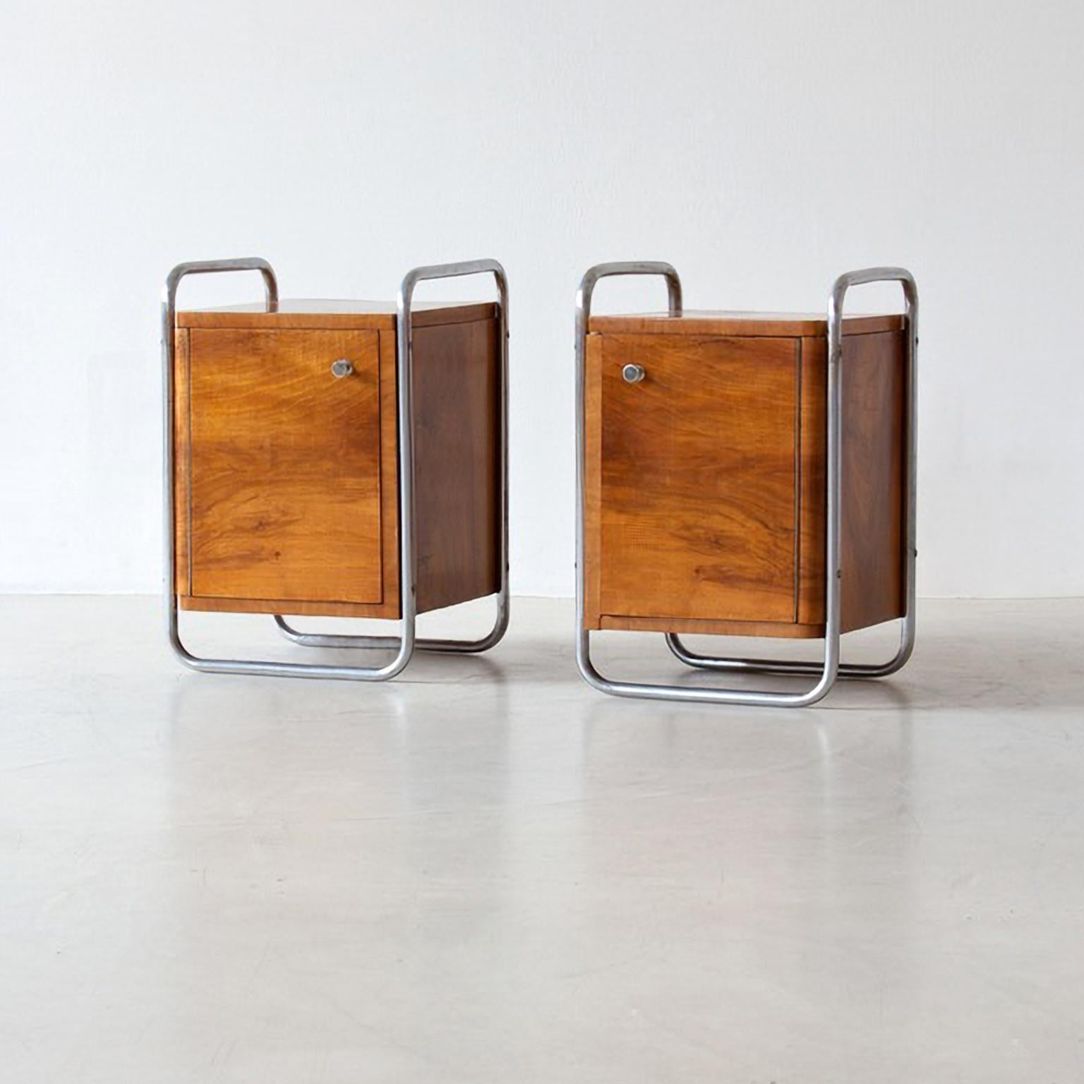 Rationalist bedside cabinets made of Nickel plated metal and walnut veneered wood, Italy, c. 1930.