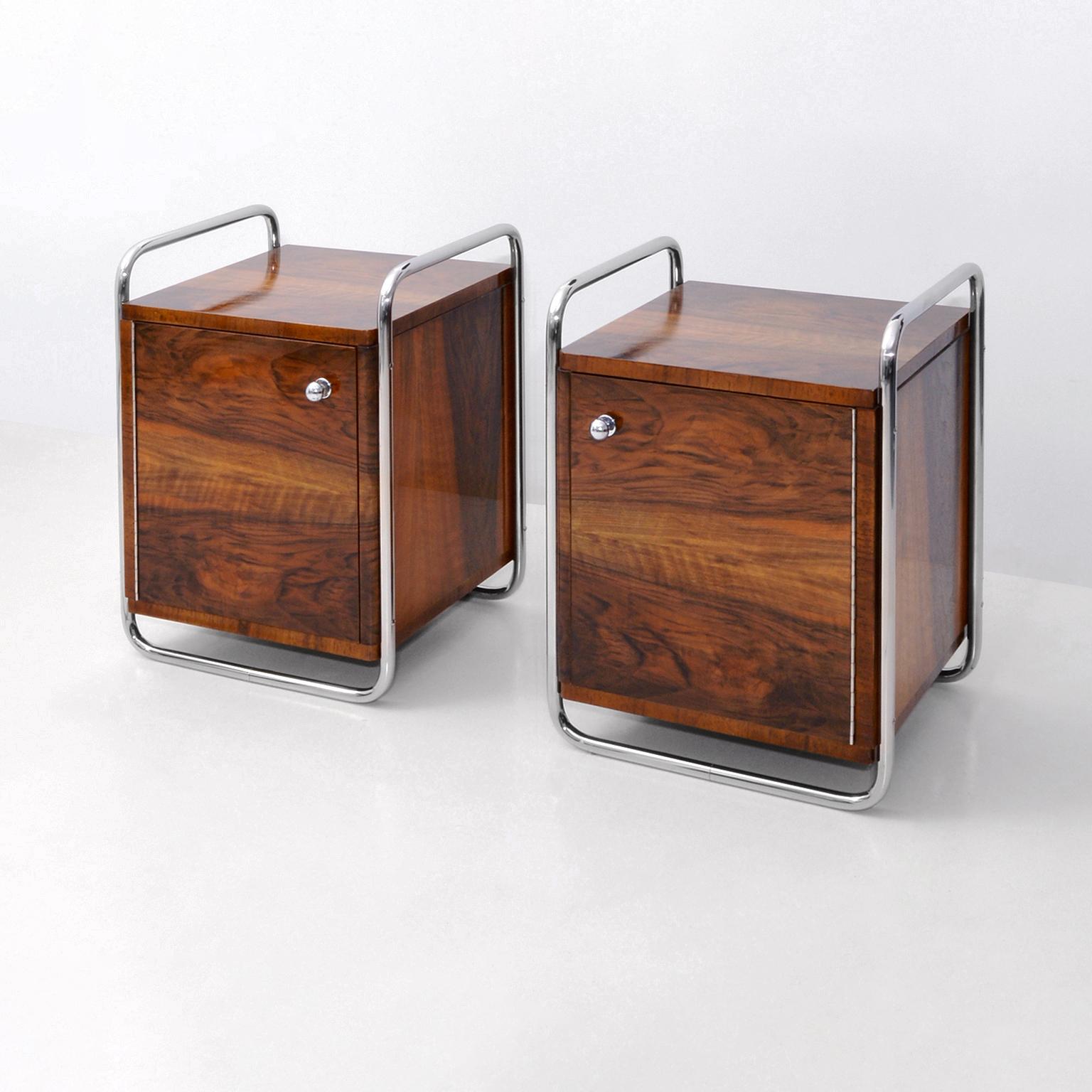 Rationalist bedside cabinets made of nickel-plated metal and walnut-veneered wood, Italy, ca. 1930.