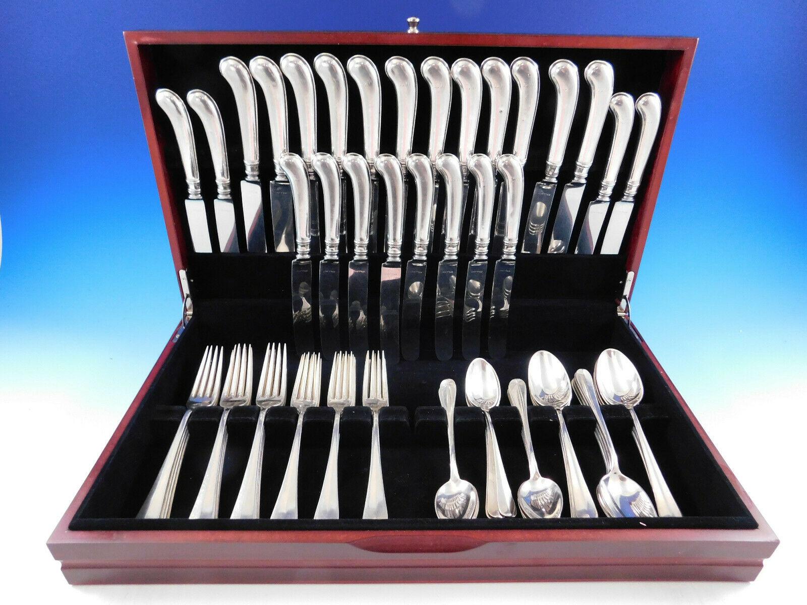 Superb Rattail Antique by Dominick and Haff sterling silver Dinner & Luncheon size Flatware set with fabulous pistol-grip handle knives - 72 pieces. This set includes:
 
12 dinner size knives, pistol-grip, 9 3/4