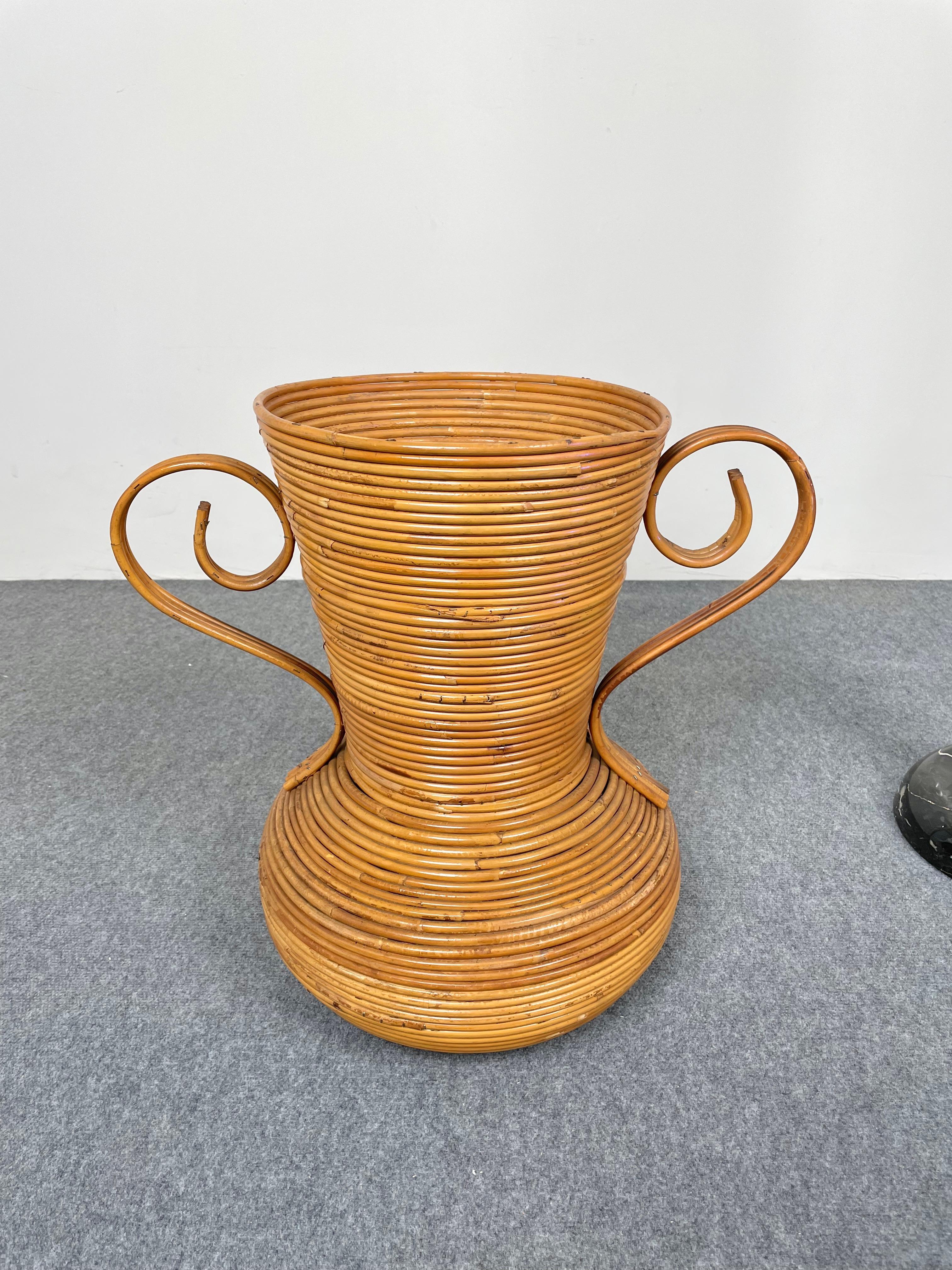 1960s rattan vase with two handles in the shape of an ancient Amphora by Vivai del Sud, Rome, Italy.