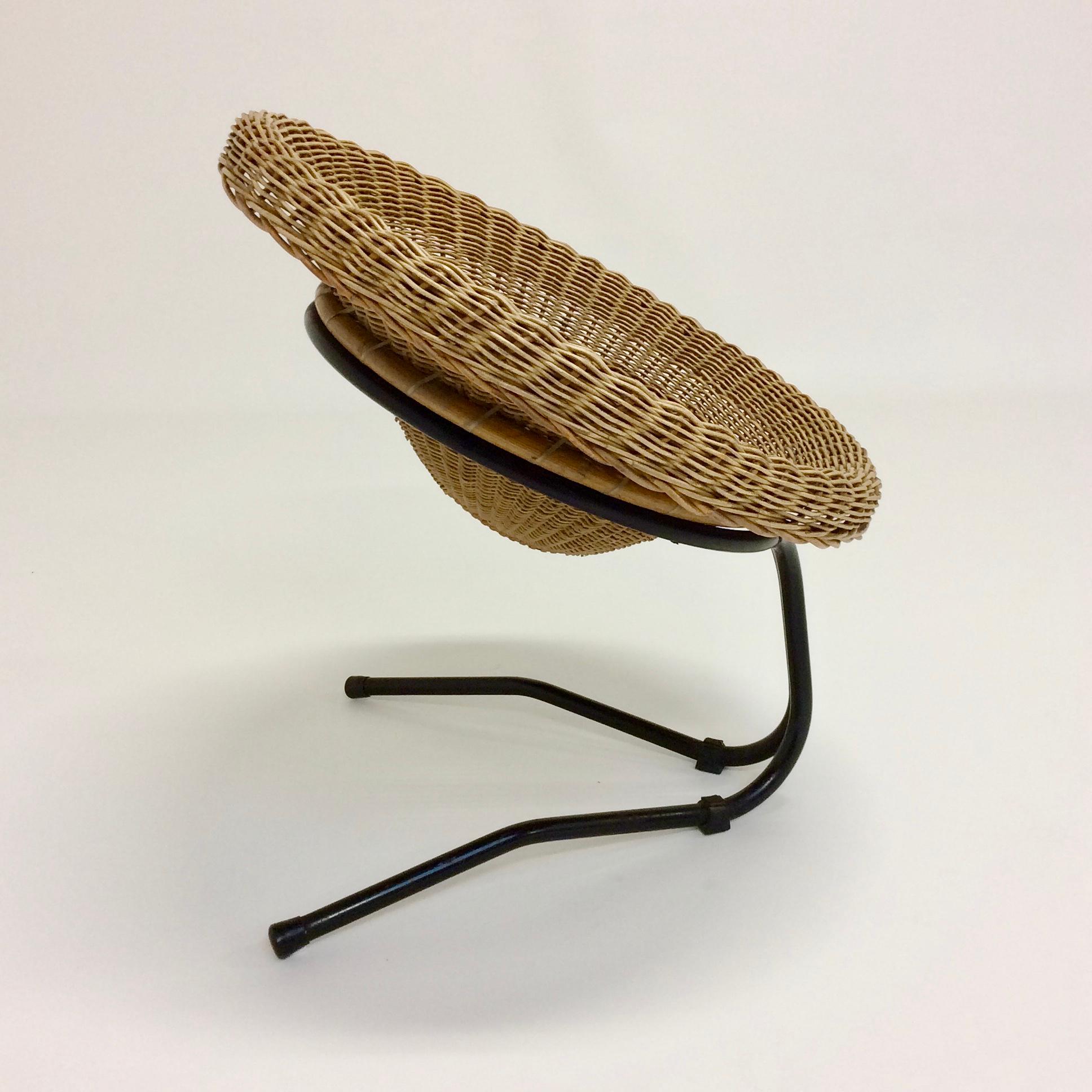 Nice rattan and bamboo armchair, Italy, circa 1960.
Black enameled steel base, rubbers.
Dimensions: 78 cm W, 68 cm D, 78 cm H, seat height 42 cm.
Good original condition.
All purchases are covered by our Buyer Protection Guarantee.
This item can be