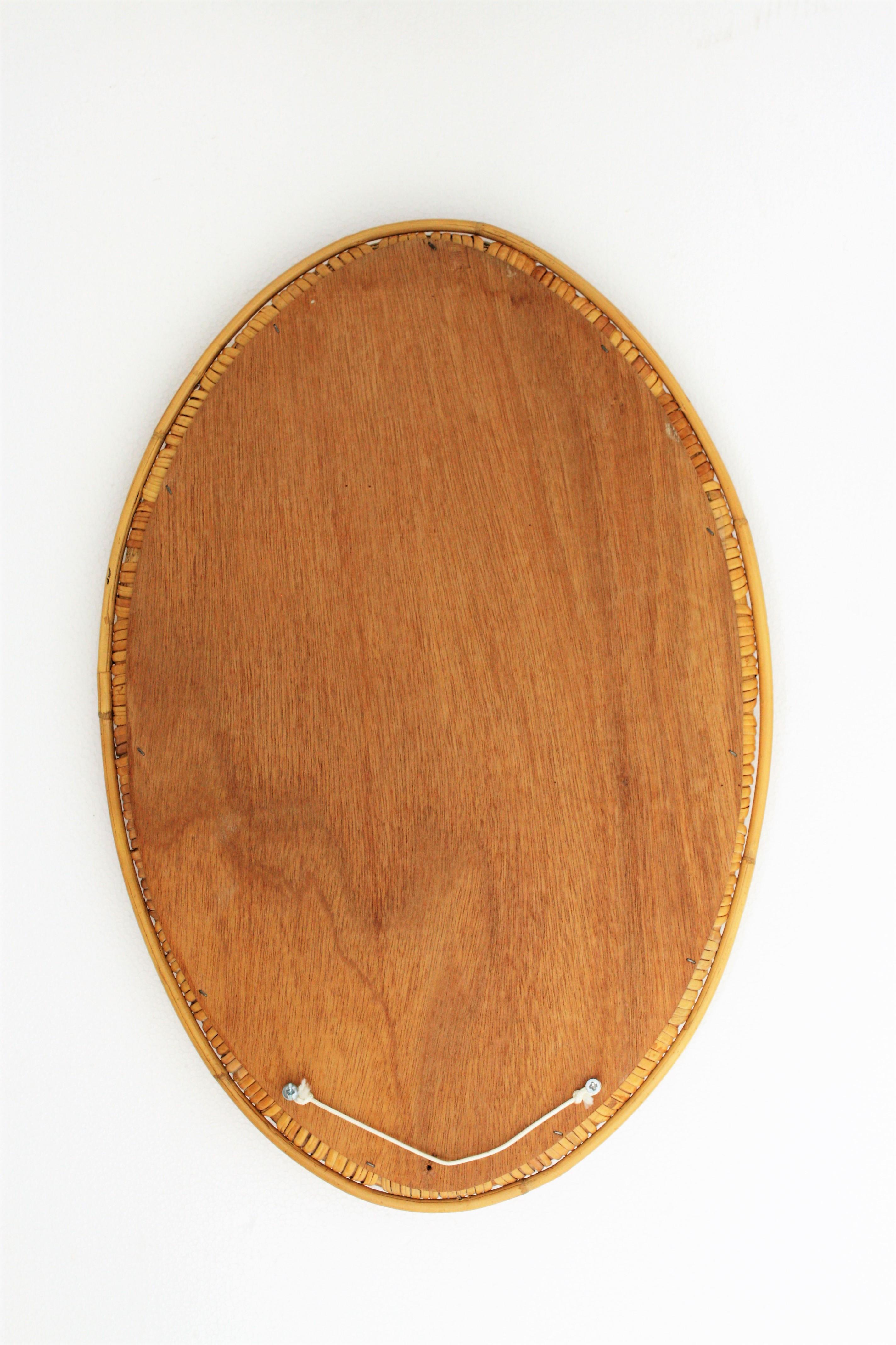 French Riviera Rattan Oval Mirror, Frame with Knot Details For Sale 2