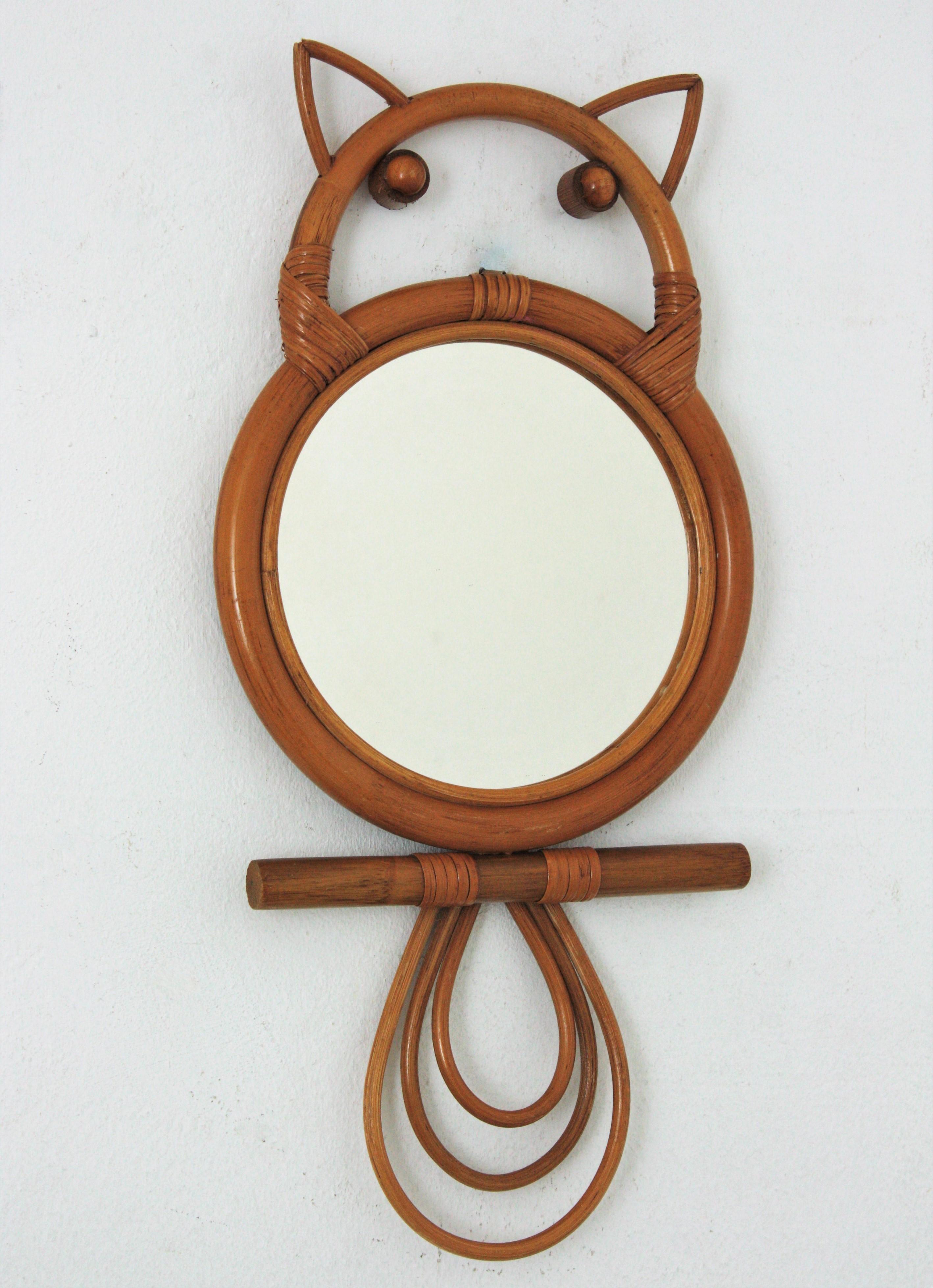 A cool French Riviera owl shaped bamboo and rattan mirror handcrafted in France at the 1950s.
This mirror is lovely to place it alone at a kids room but it will be a nice addition as a part of a rattan mirrors collection creating a big wall