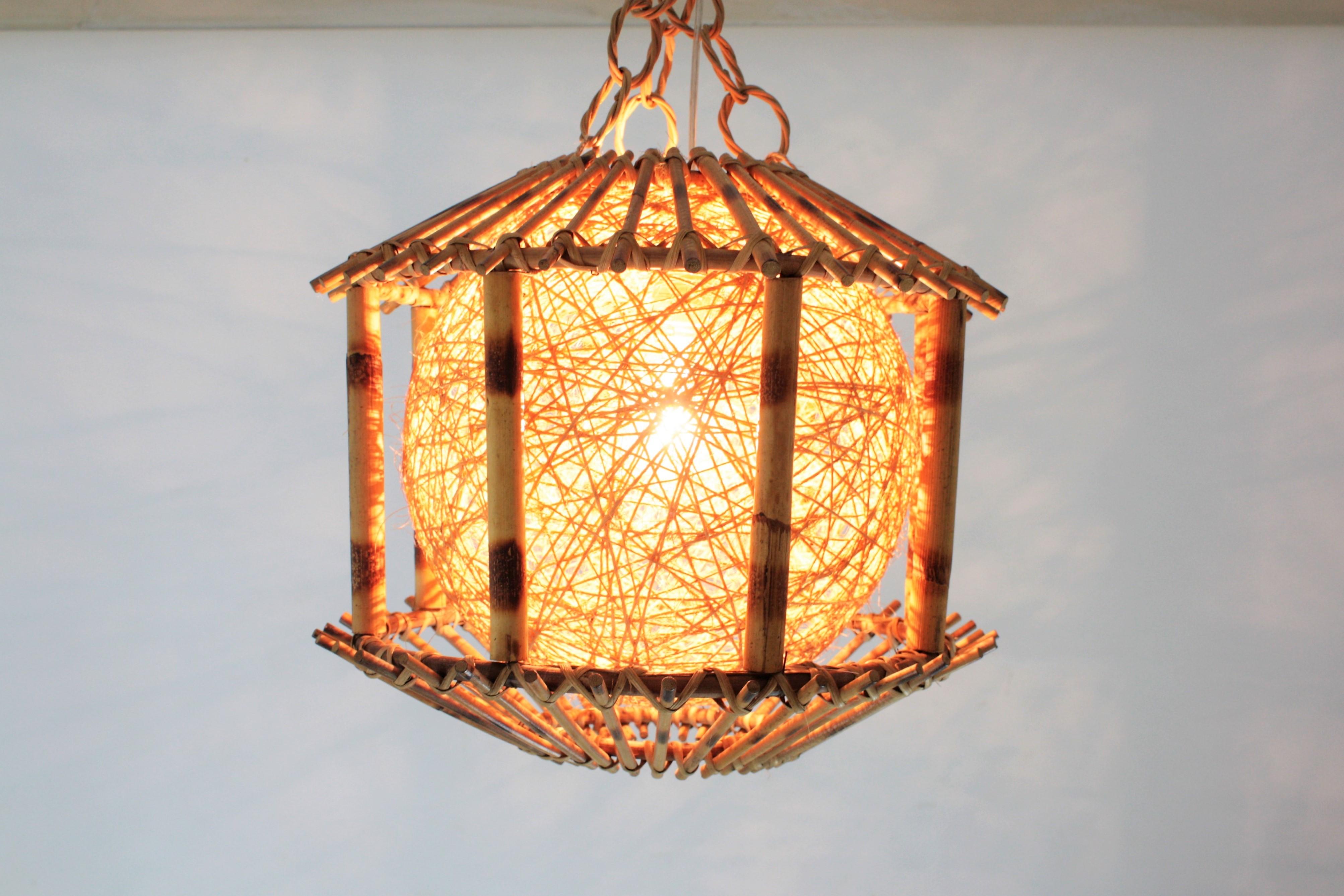 20th Century Rattan and Bamboo Pendant Hanging Lamp / Lantern with Chinoiserie Accents