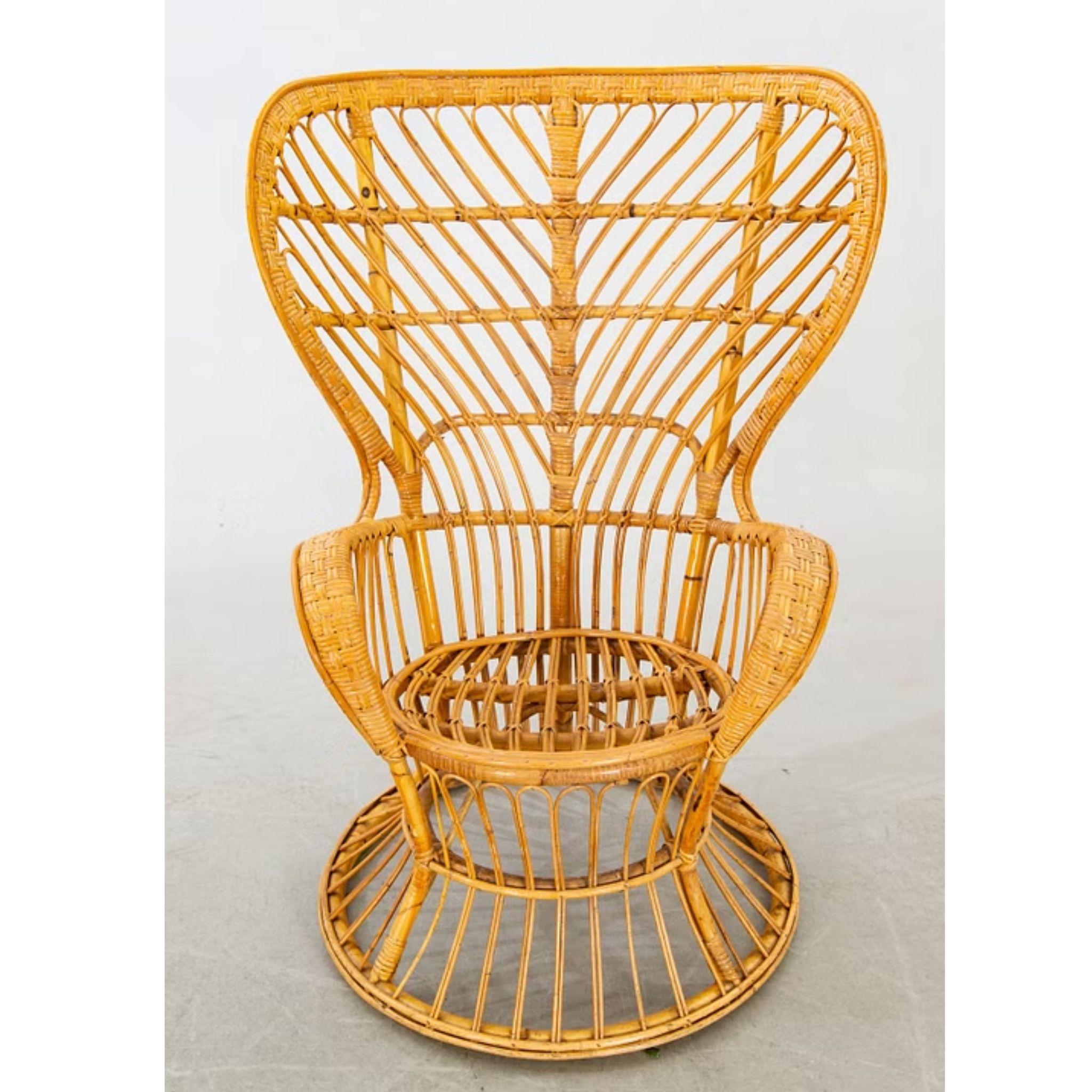 A striking example of 1970s Scandinavian craftsmanship, this vintage woven Scandinavian chair embodies the clean lines and natural materials that defined mid-century design. Woven rattan set over a solid bamboo frame creates a gently curved seat and