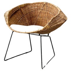 Used Rattan and bouclé easy chair