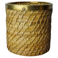 Rattan and brass book basket, Italy, 1970