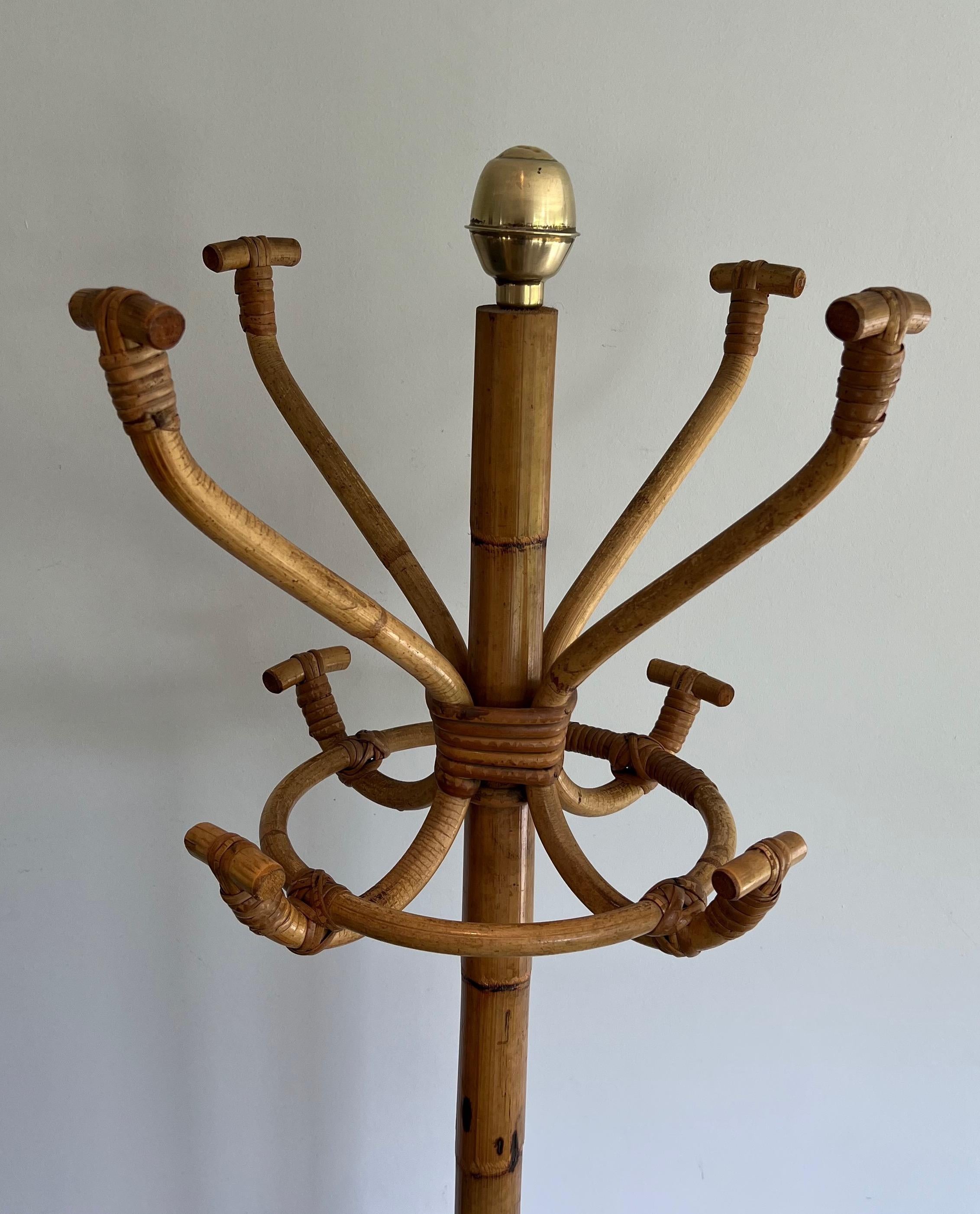 Mid-Century Modern Rattan and Brass Coat rack on stand. French Work. Circa 1970 For Sale