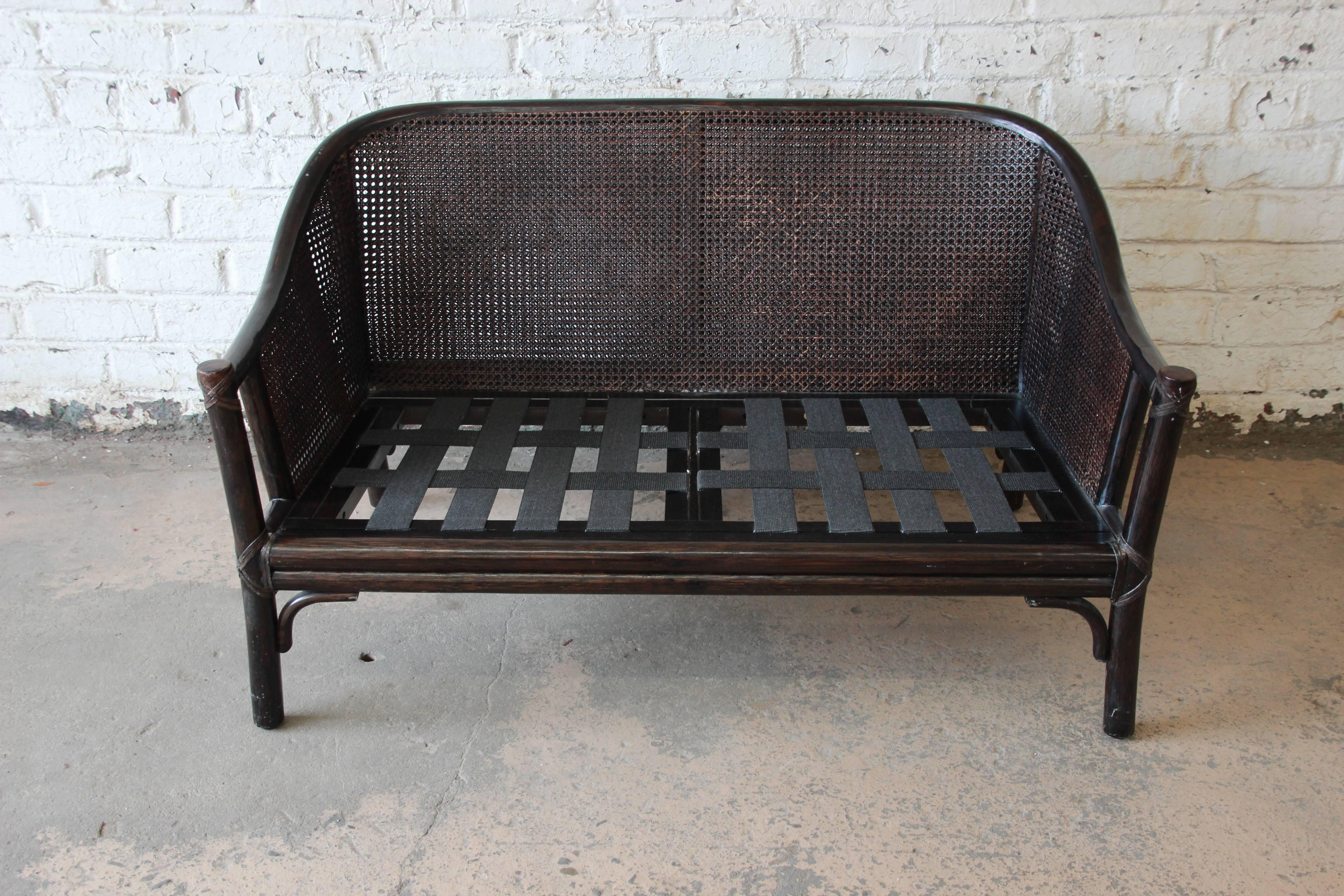 Late 20th Century Rattan and Cane Settee or Loveseat by McGuire of San Francisco