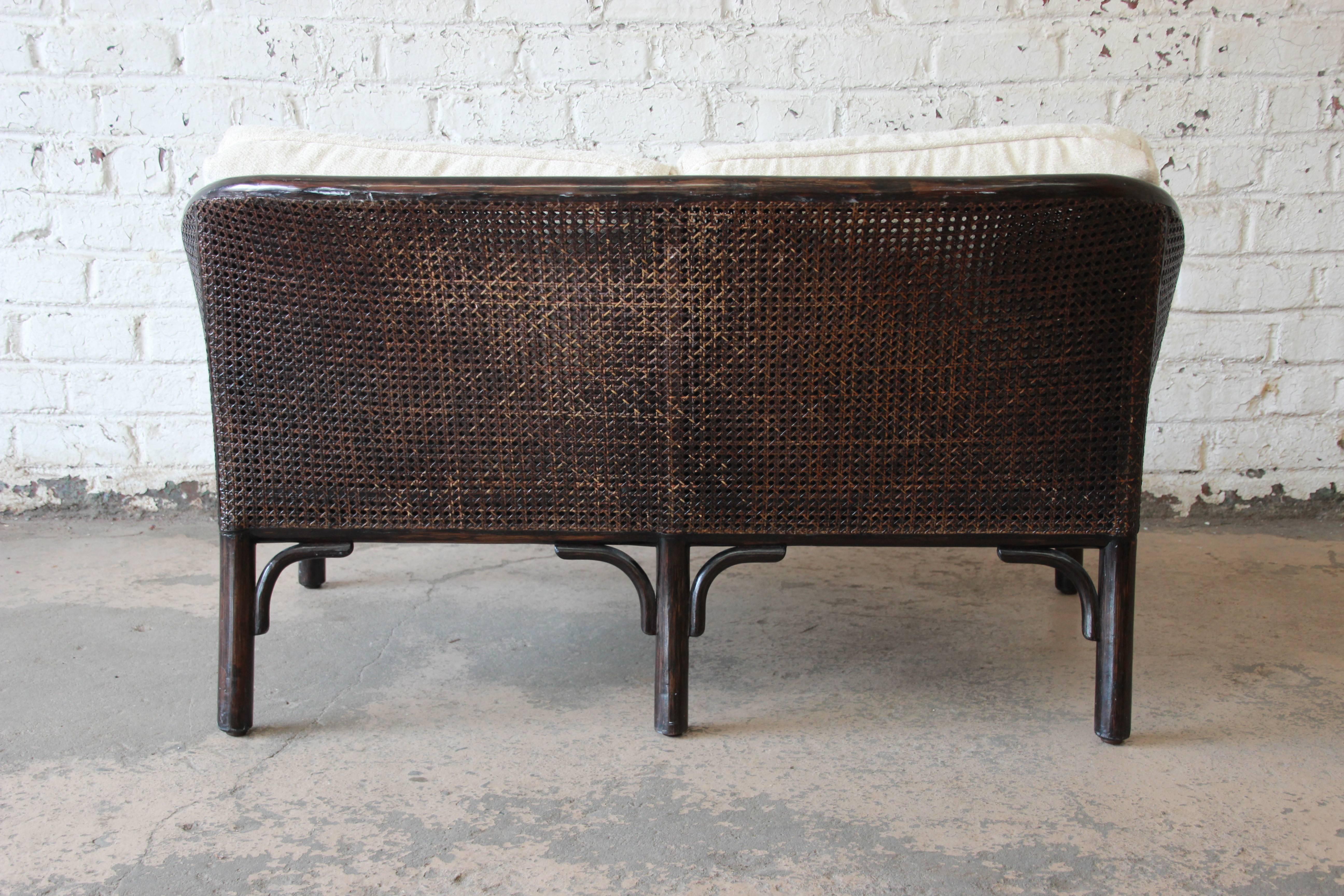 Upholstery Rattan and Cane Settee or Loveseat by McGuire of San Francisco
