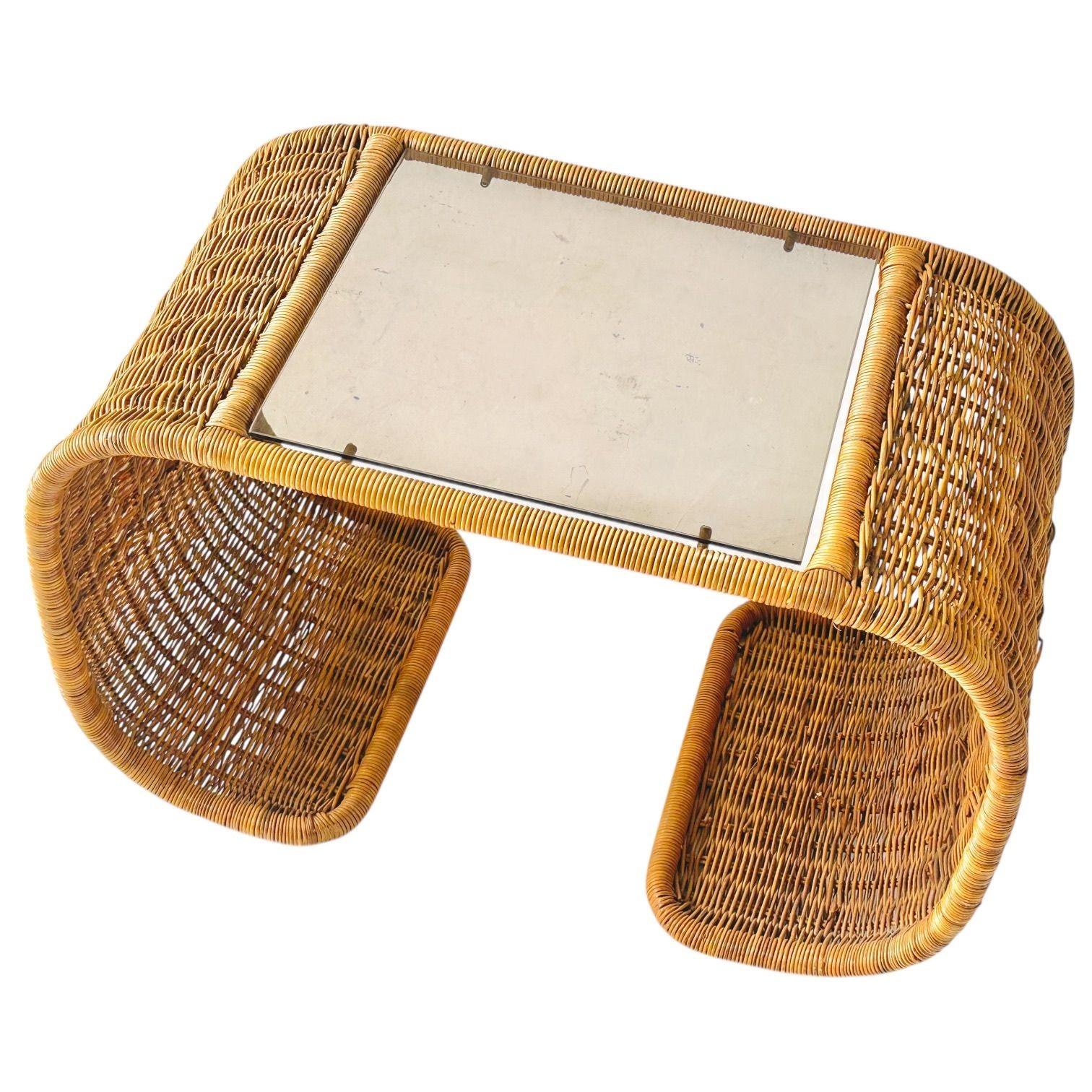 Rattan and Smoked Glass Waterfall Side/End Table, 1970’s.  Original great condition.  Coffee table sold in separate listing.
Measures  21.25” tall 34” long 18.25” deep