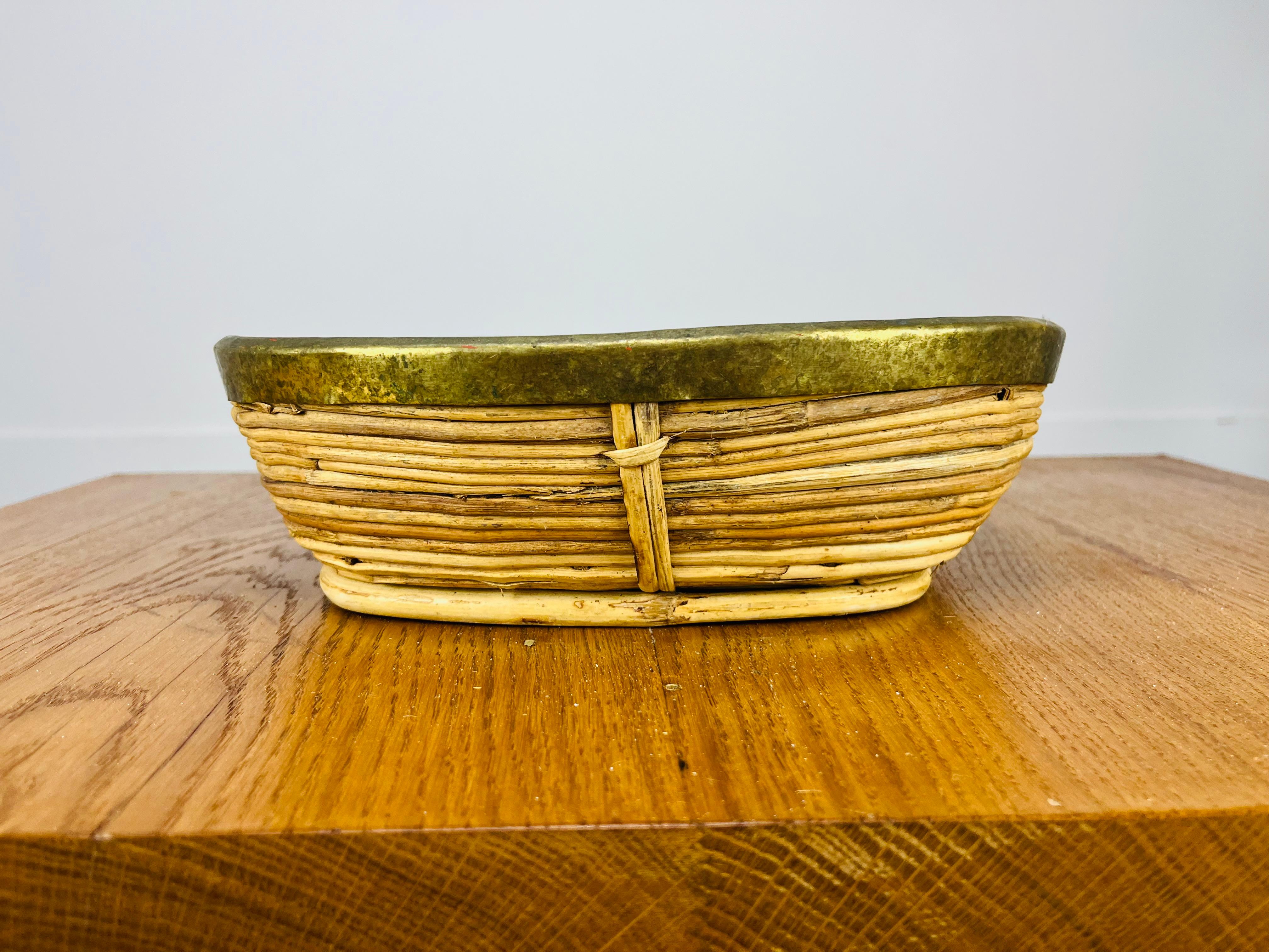 Italiano Rattan and golden brass basket, Italy, 1960's in vendita