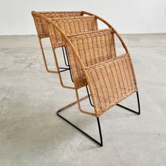 Rattan and Iron Magazine Rack attributed to Jacques Adnet