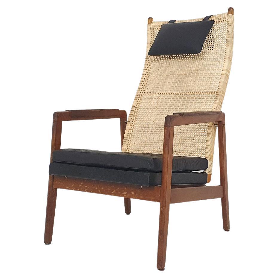 Rattan and leather high-back lounge chair by P.J. Muntendam for Gebr. Jonkers For Sale