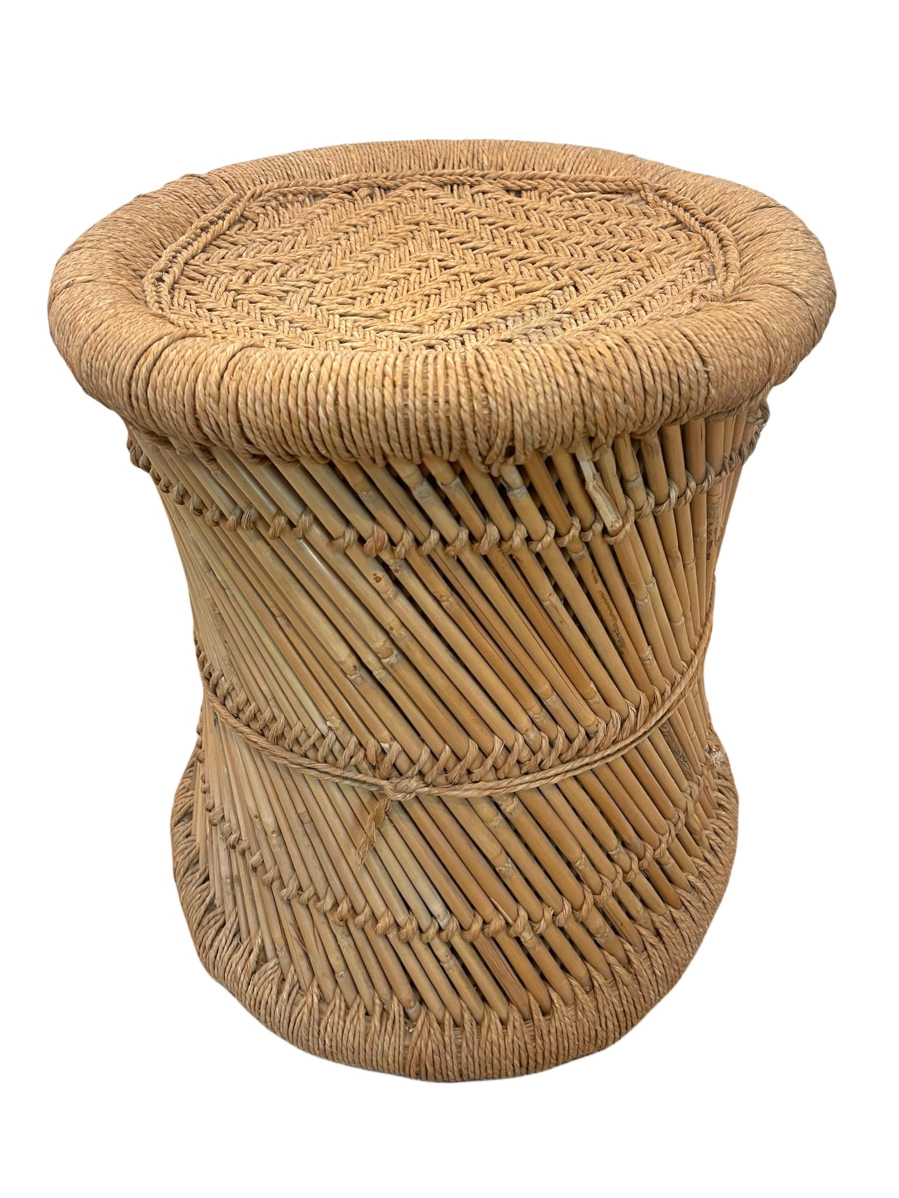 Rattan and rope stool.

Mid-Century Modern rattan and bamboo round stool. This amazing item was produced circa 1970s. This piece is fantastic as it is very adaptable in very good original condition. This stool is perfect to improve a living room,