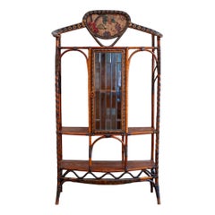Estantería de ratán y junco con puerta de cristal biselado – Dal Vera – 1910