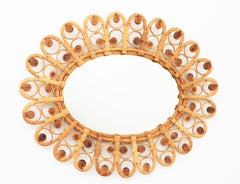 Rattan and Wicker Large Oval Mirror with Filigree Peacock Frame, Spain, 1960s