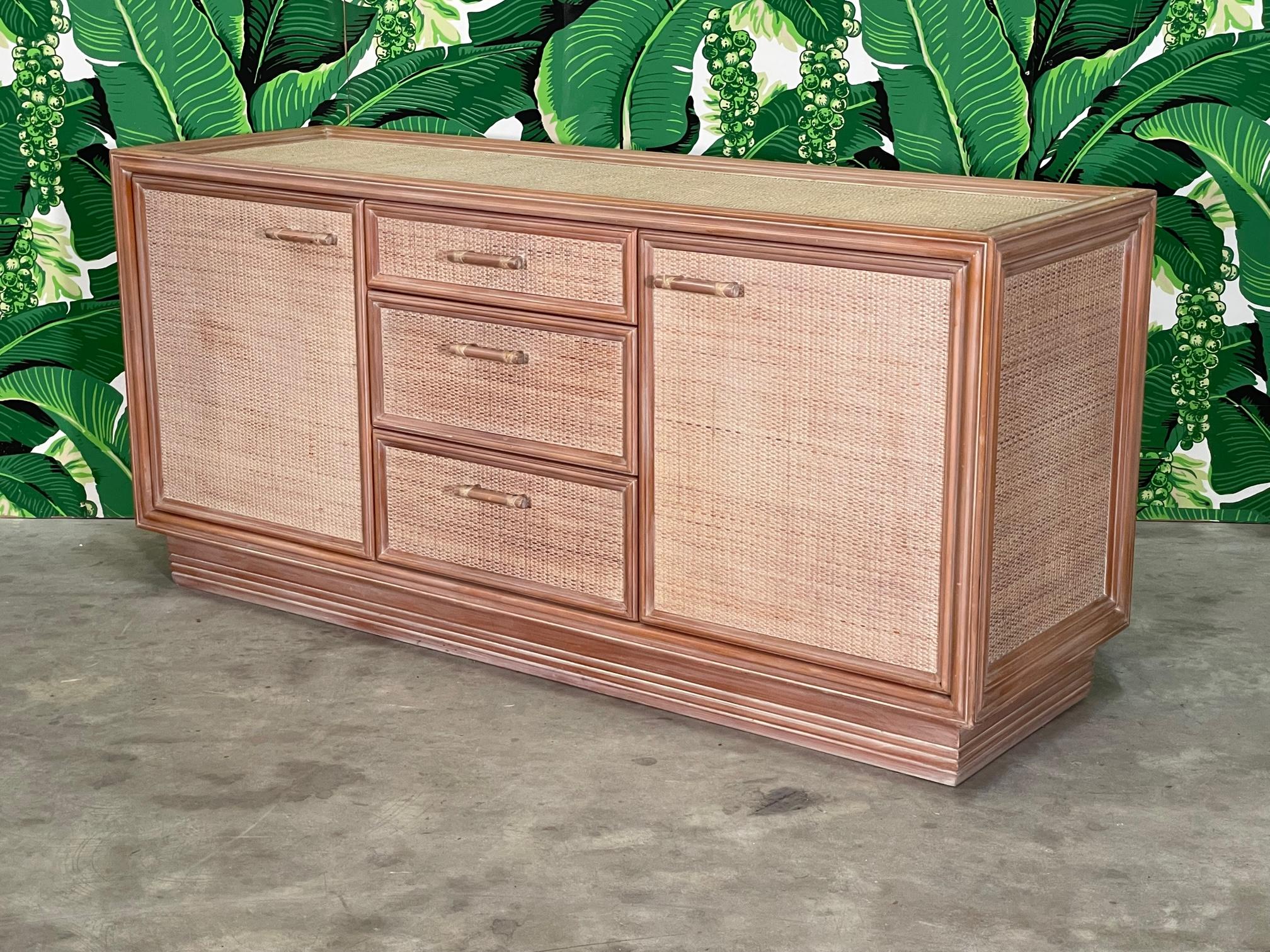 Rattan and wicker sideboard could be used as credenza or dresser. No maker's mark but similar to pieces made by Guire. Marked 