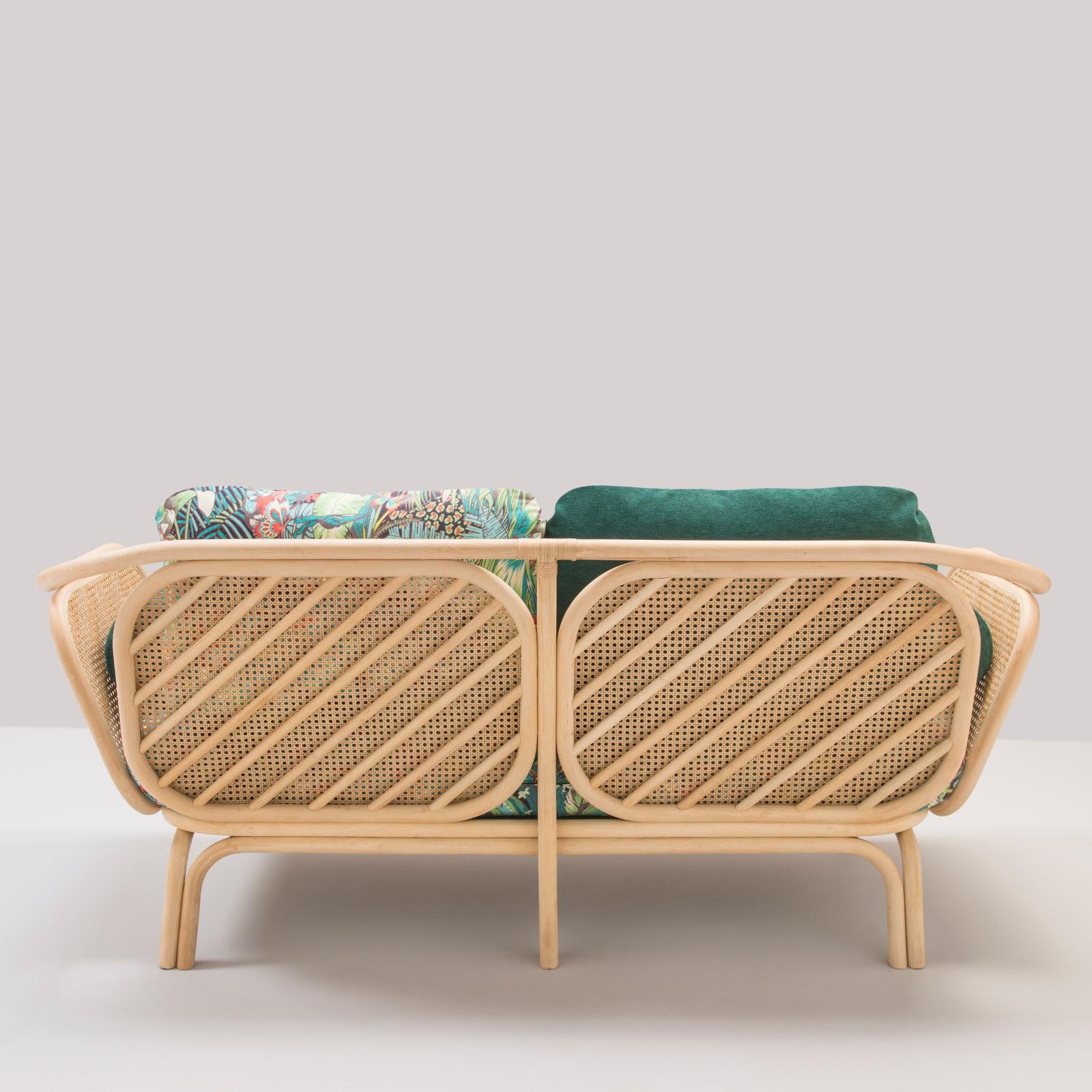 Timeless and airy lines, trendy and graphic design for this French sofa composed of a robust rattan structure decorated with caned windows and gorgeous fabric (new item, never used).