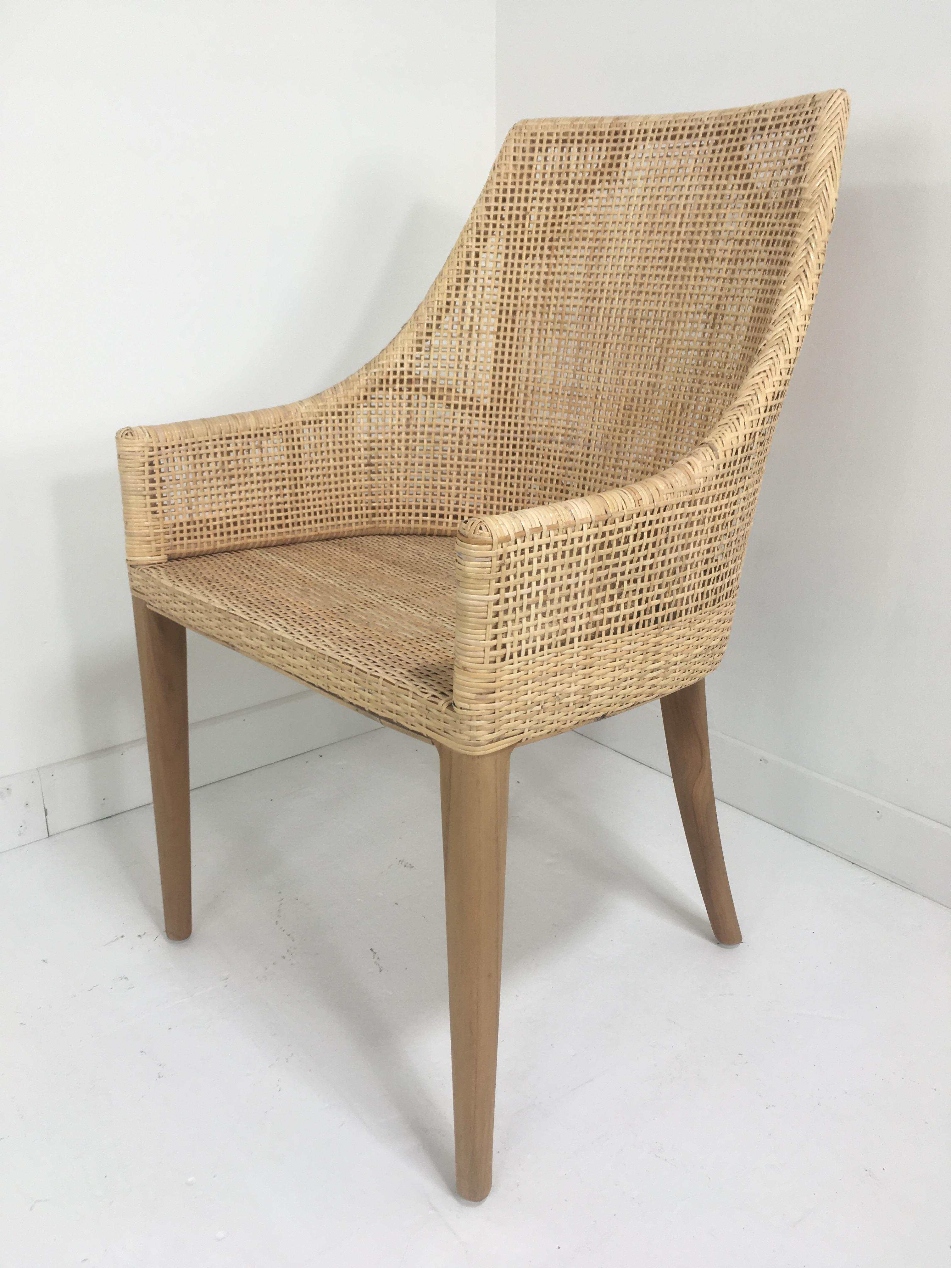 Elegant set of six rattan armchairs with teak wooden feet and handcrafted braided rattan seat combining quality, robustness and class. They will be perfect on your terrace, in your veranda, your winter garden, around the dining table and even in