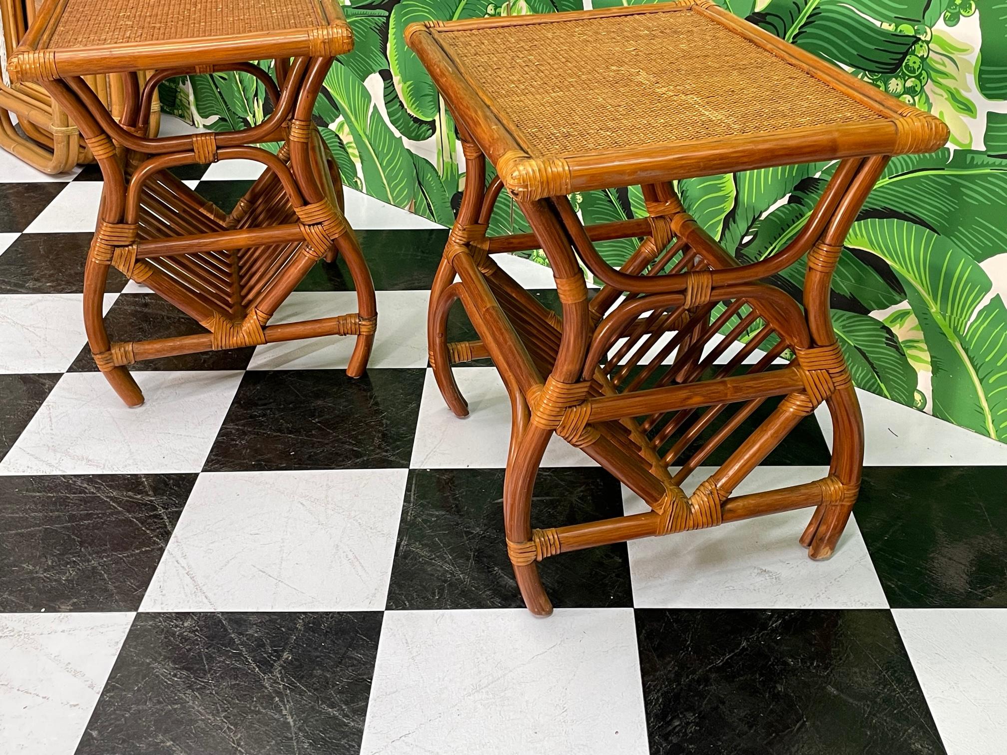 Pair of rattan end tables feature woven wicker tops and magazine racks below. Good vintage condition with imperfections consistent with age, see photos for condition details.
For a shipping quote to your exact zip code, please message us.
