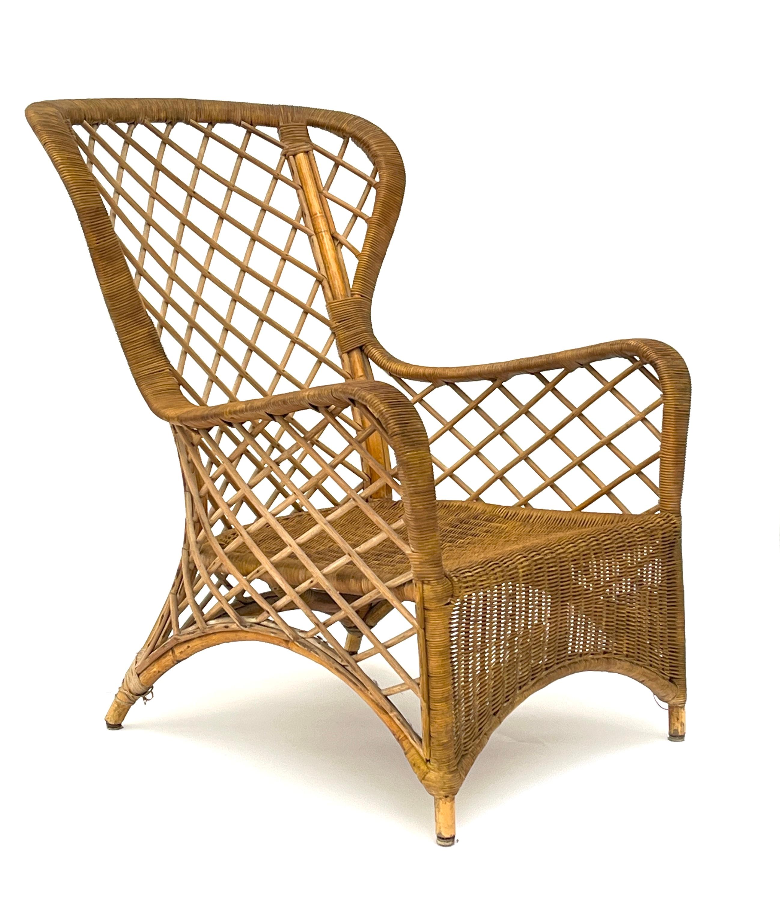 Rattan Lounge Chair (Footrest) Attributed to Louis Sognot, 1952

This armchair is attributed to Louis Sognot and edited by Chevallier in 1952. This mid 20th century rattan armchair comes with its footrest. It could also be accompanied by cushions as