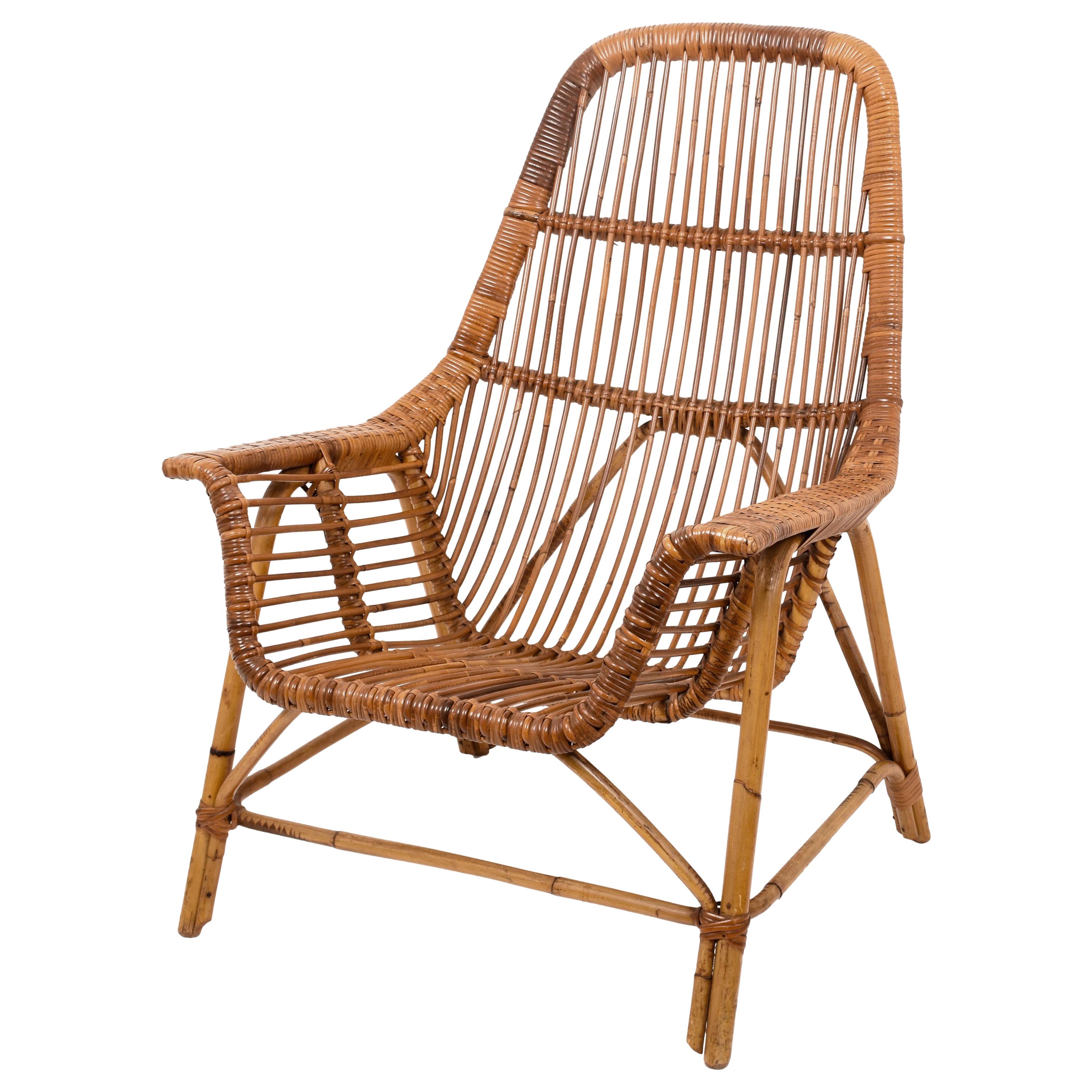 Rattan armchair by George Coslin for Gervasoni.
Rattan armchair, by George Coslin for Gervasoni in excellent condition.
Year 1956 from Italy.