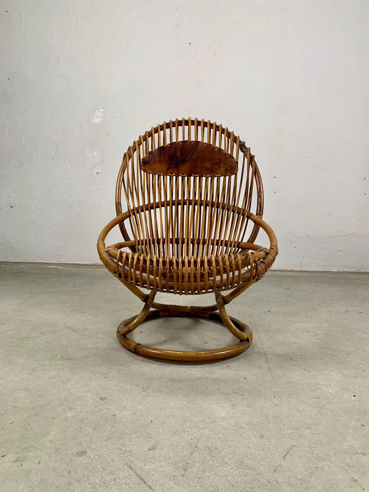 Rattan armchair mod. Tre cerchi by Tito Agnoli for Bonacina, Italy, 1960s 
Rattan armchair with vintage leather headrest, historic model Tre Cerchi model by Bonacina, made in Italy.
84 x 73 x h97 cm  