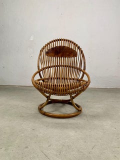 Rattan armchair mod. Tre cerchi by Tito Agnoli for Bonacina, Italy, 1960s