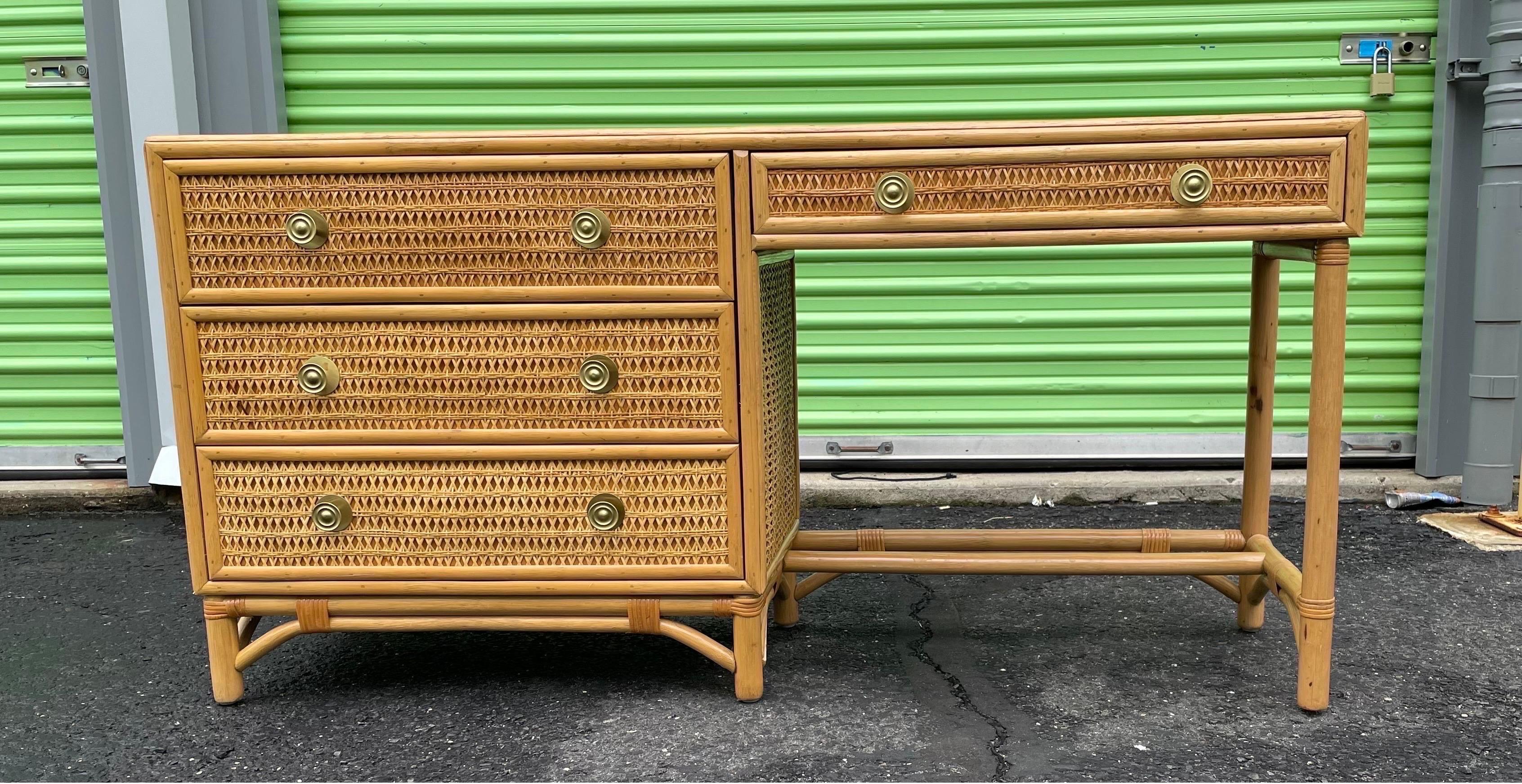 Fantastic vintage writing desk or vanity with rattan chair. Unusual piece because it has an attached chest of drawers. Beautifully caned design in the manner of Chirstian Dior & Gabriella Crespi. Glass tops to protect and offer writing area or