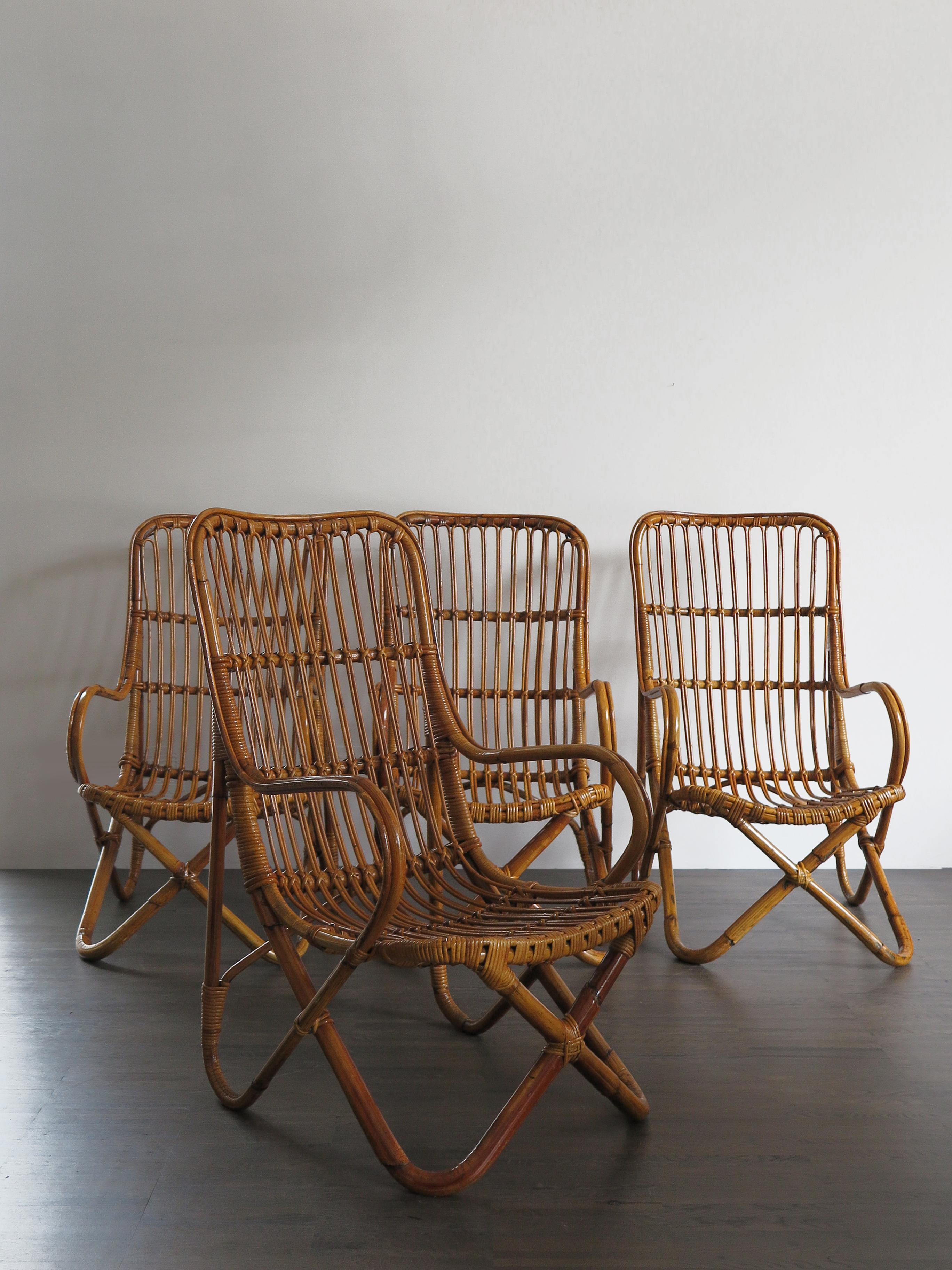Italian Mid-Century Modern design rattan bamboo armchairs in the style of Tito Agnoli Bonacina, set of fours, circa 1950s.
Please note that the armchairs are original of the period and this shows normal signs of age and use.