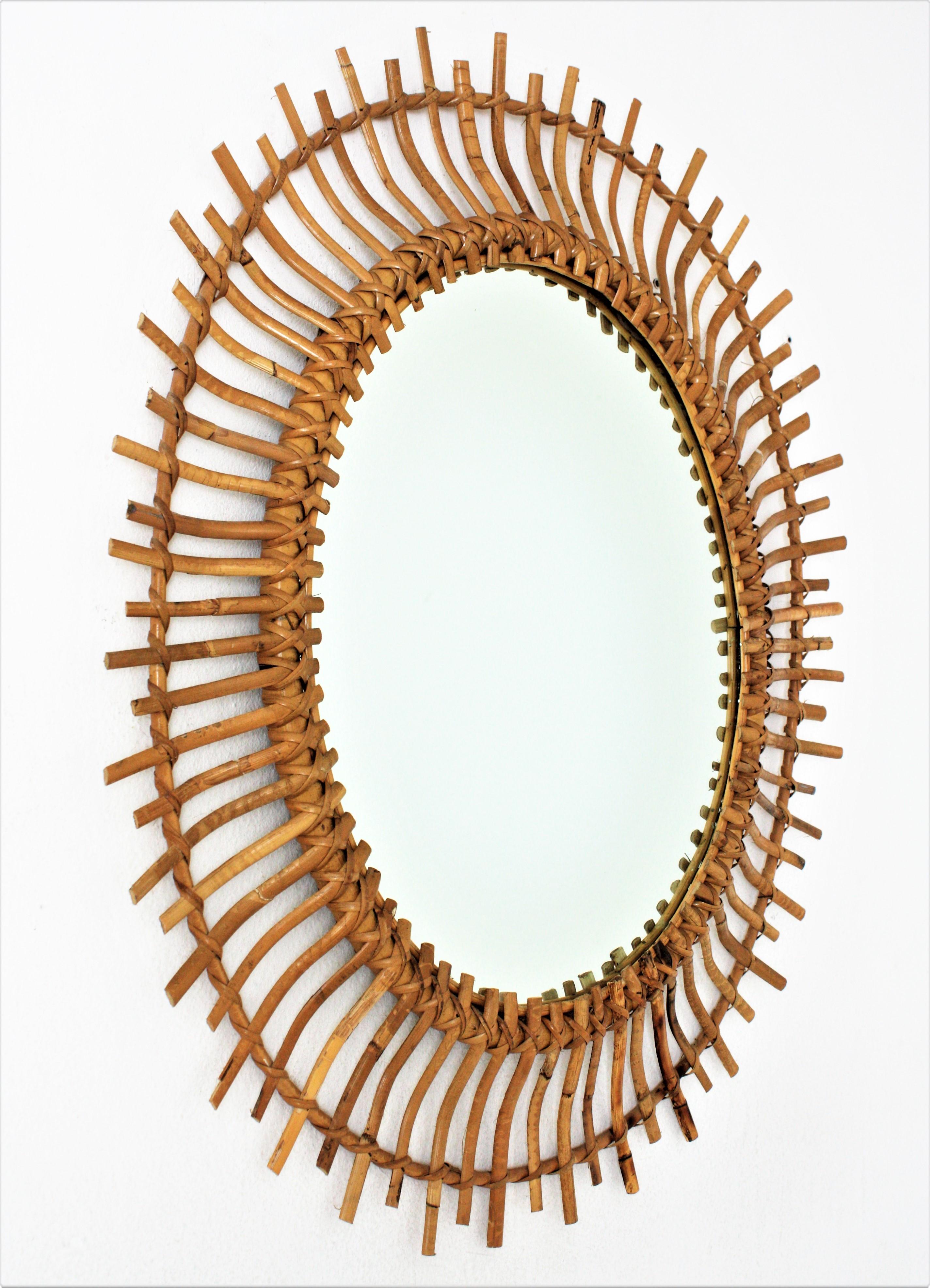 Mid-Century Modern Rattan Bamboo Oval Sunburst Mirror For Sale