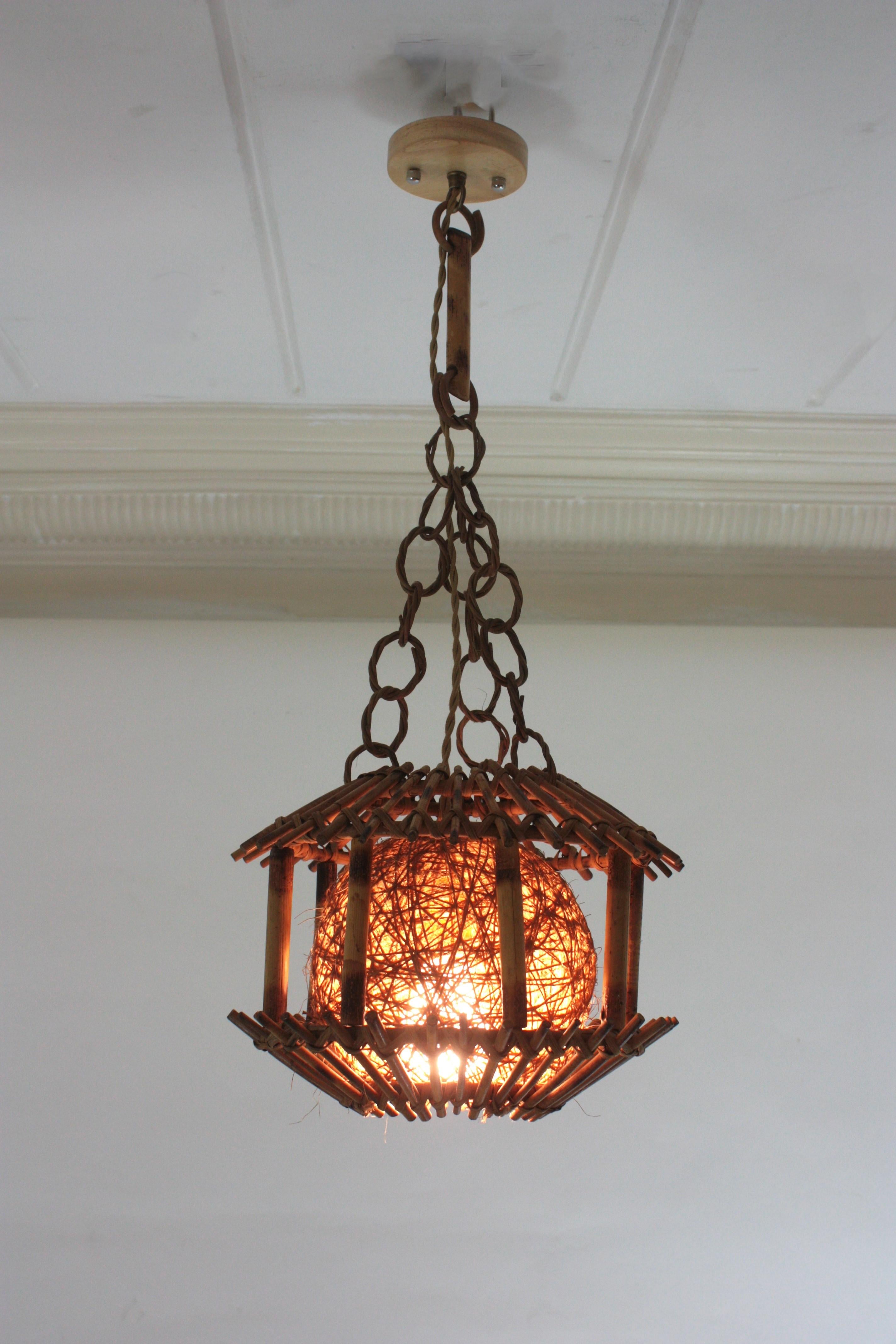 Spanish Rattan Bamboo Pendant Hanging Light or Lantern with Chinoiserie Accents, 1950s For Sale