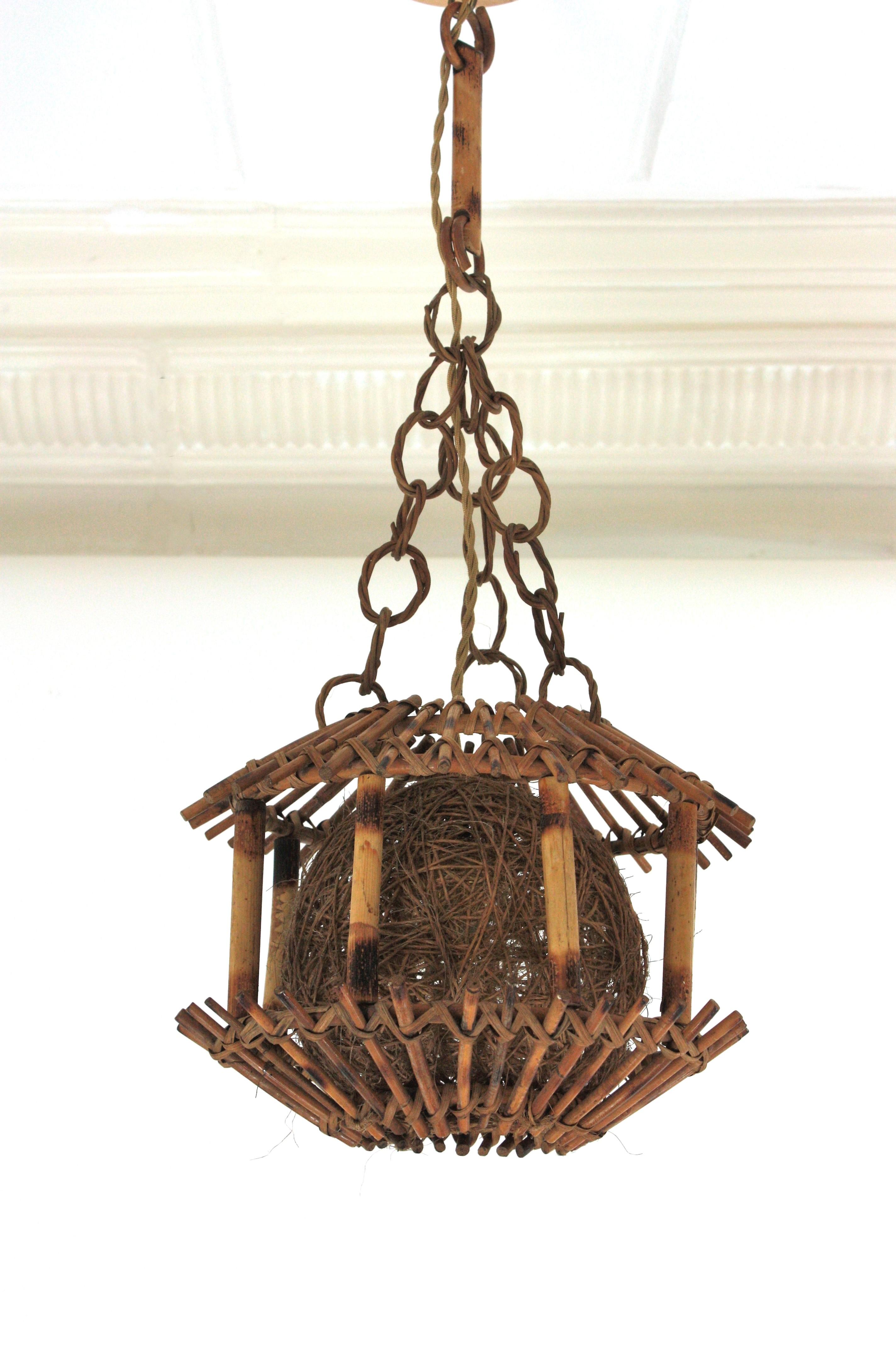Hand-Crafted Rattan Bamboo Pendant Hanging Light or Lantern with Chinoiserie Accents, 1950s For Sale