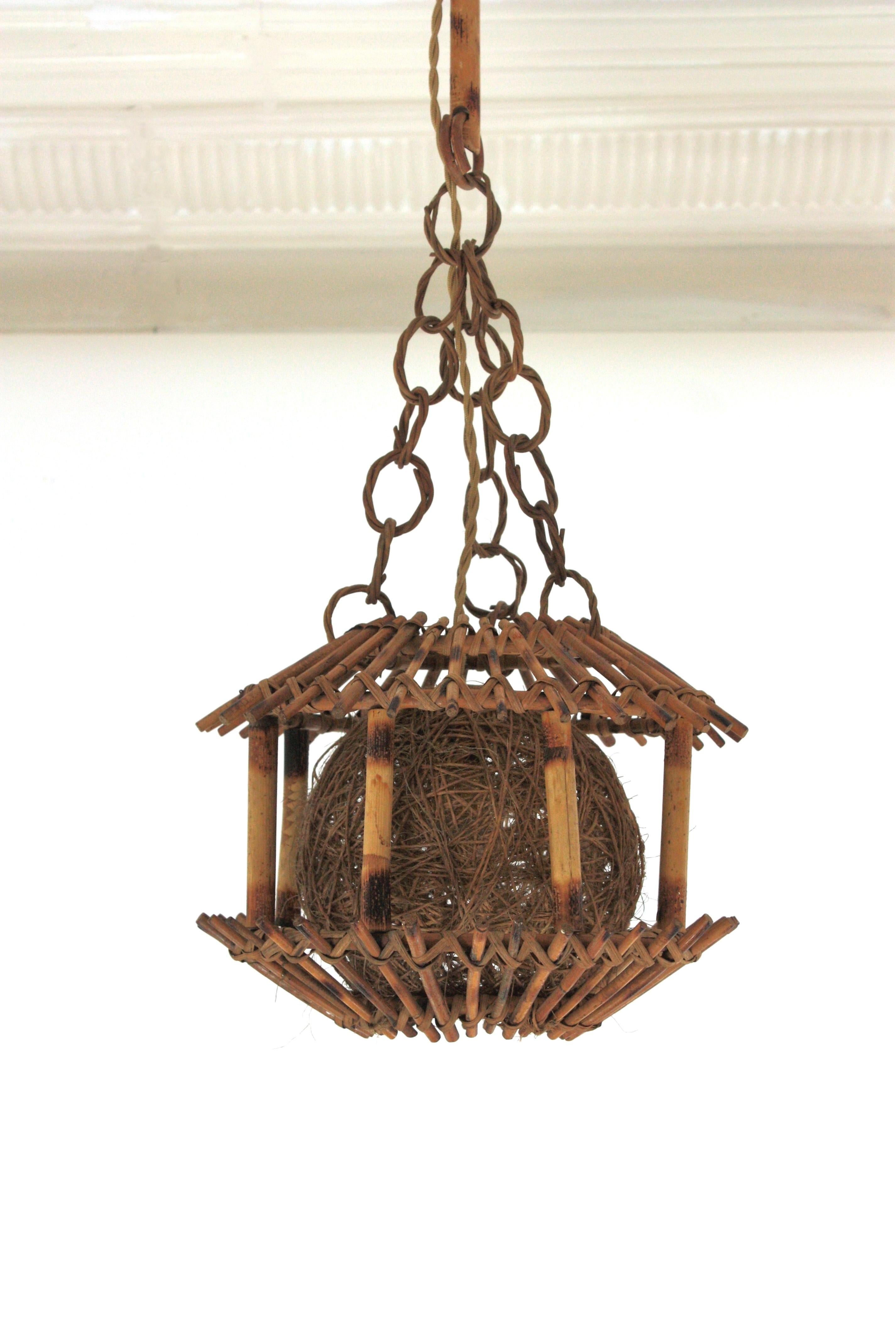 20th Century Rattan Bamboo Pendant Hanging Light or Lantern with Chinoiserie Accents, 1950s For Sale