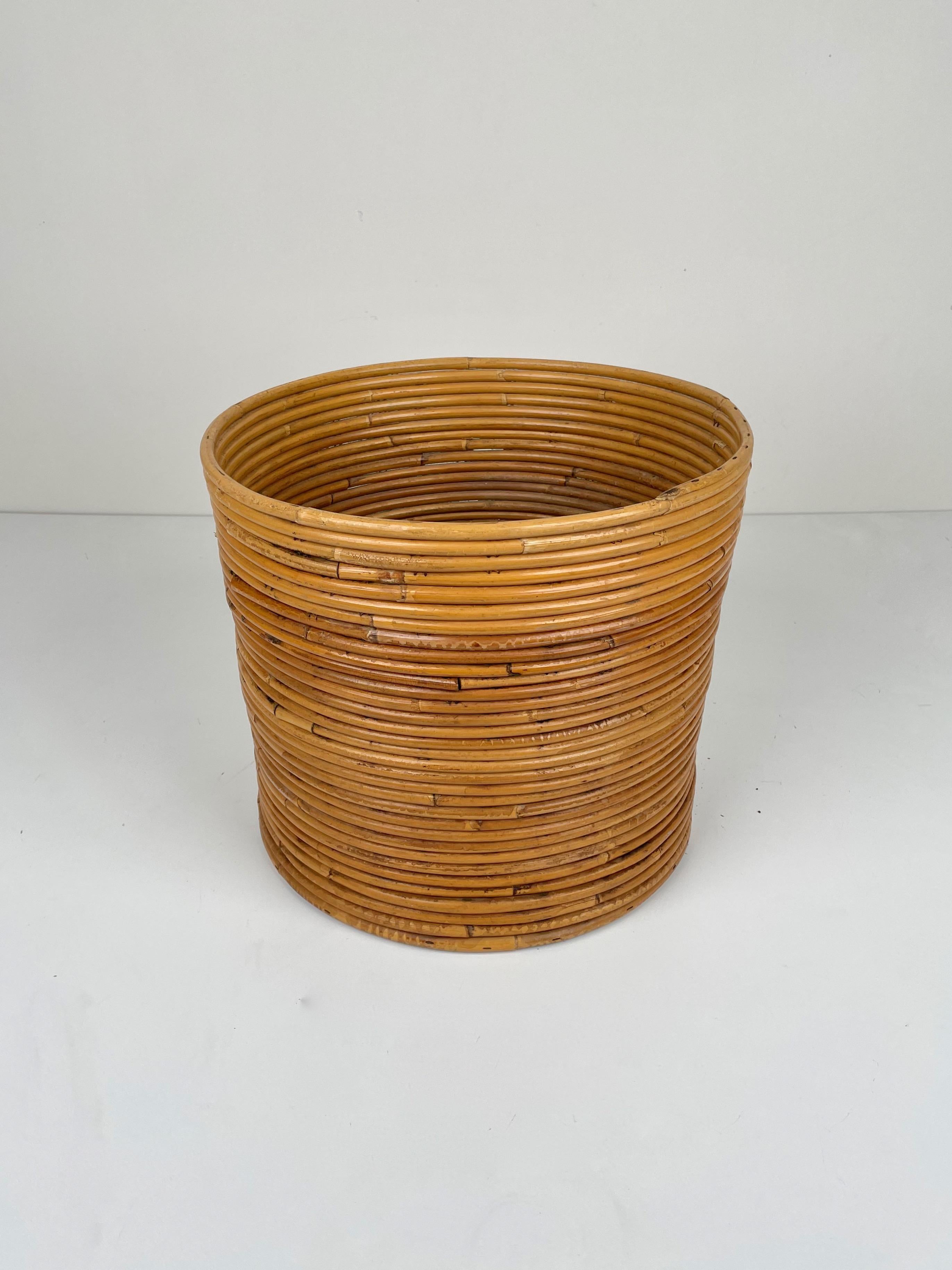 Basket / vase made all of rattan. Made in Italy in the 1960s.